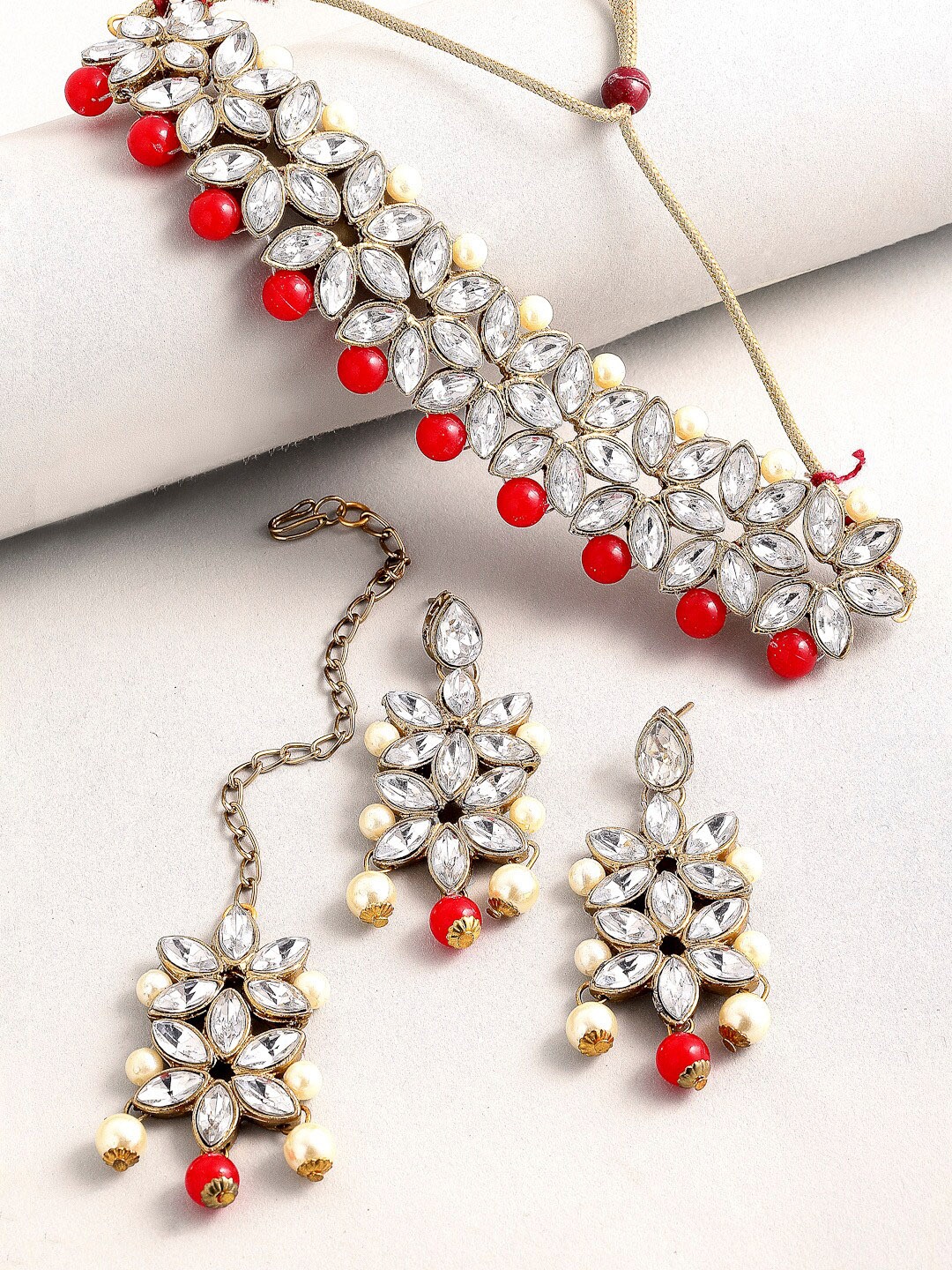 

Kennice Gold-Plated Stone-Studded & Beaded Jewellery Set With Maang Tika