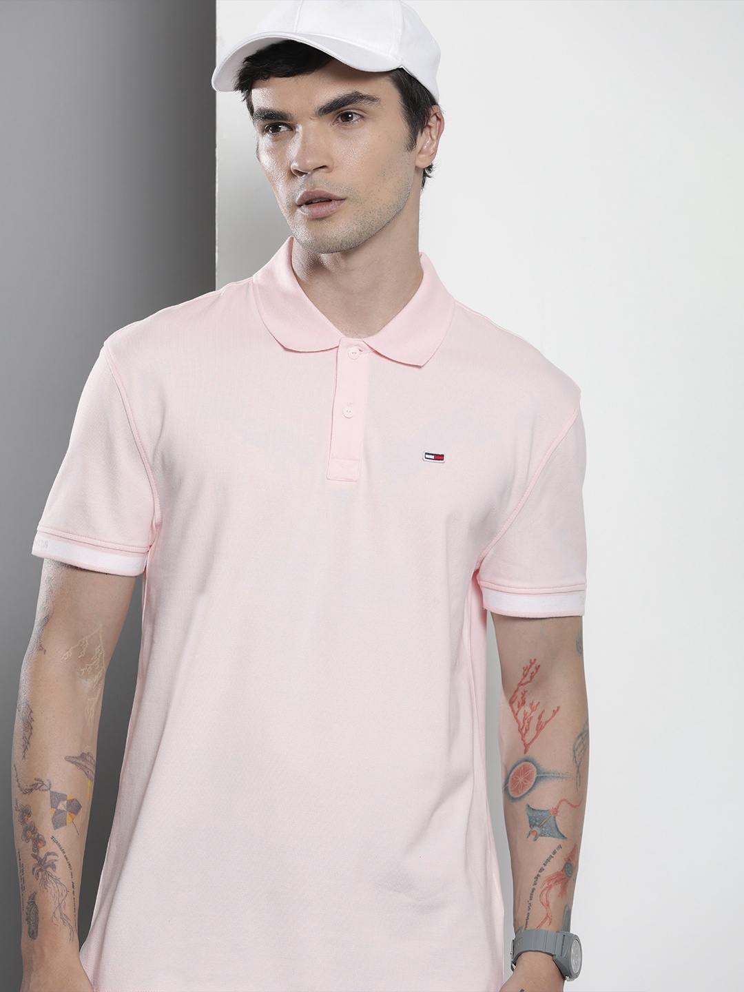 

Tommy Hilfiger Men Solid Short Sleeves Polo Collar Casual T-shirt, Pink