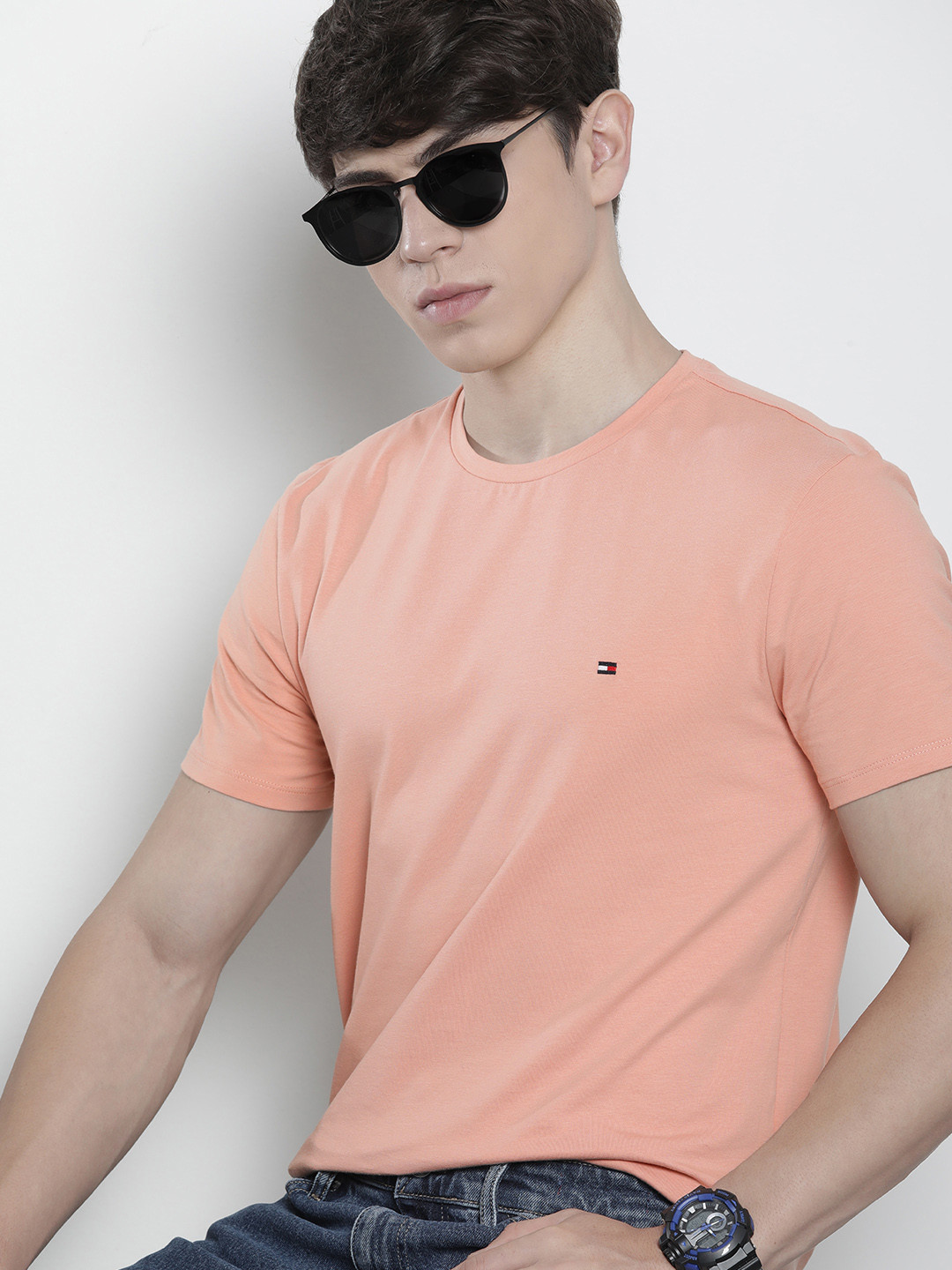 

Tommy Hilfiger Men Solid Round Neck Slim Fit T-shirt, Peach