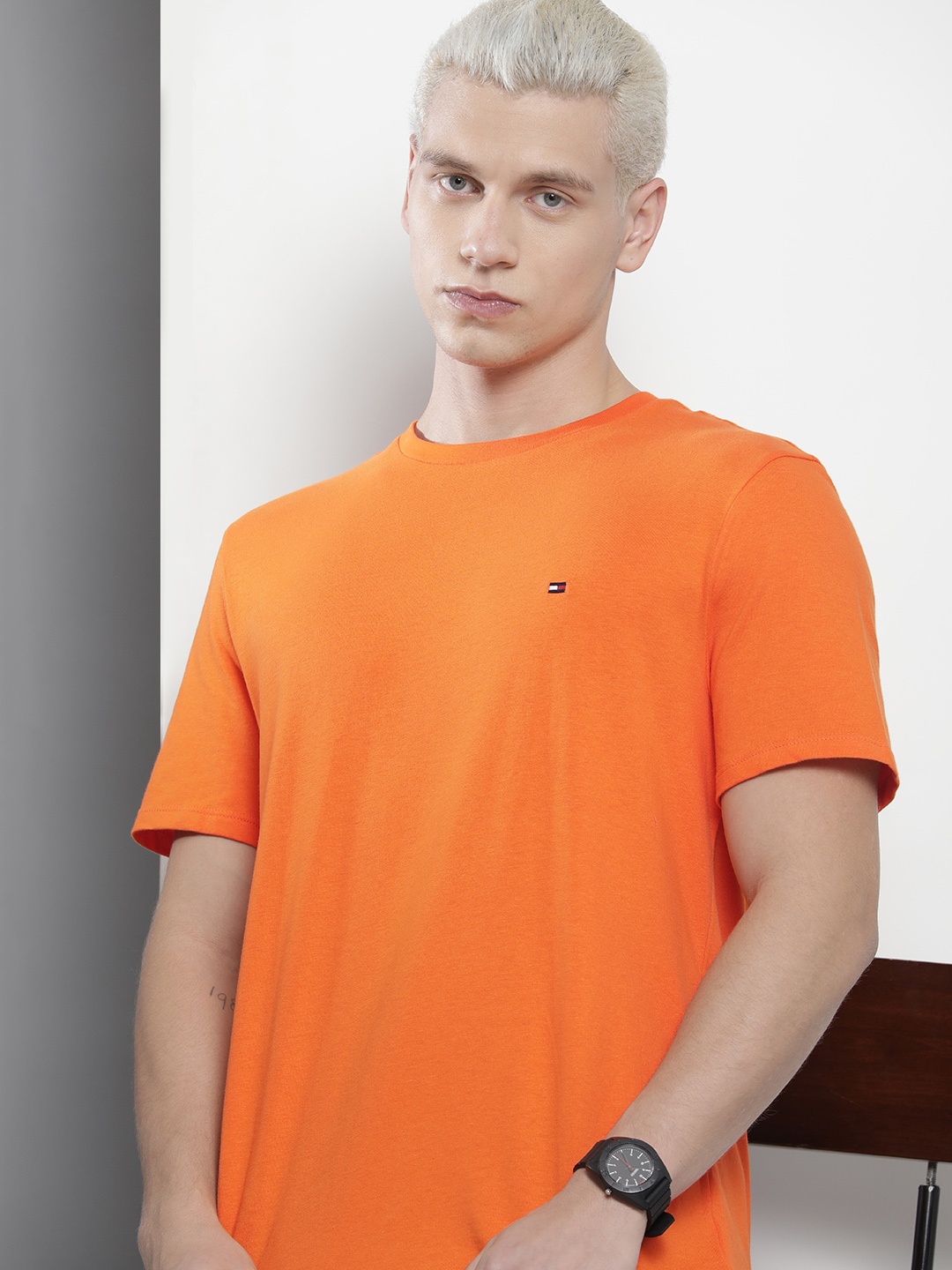 

Tommy Hilfiger Men Solid Pure Cotton T-shirt, Orange