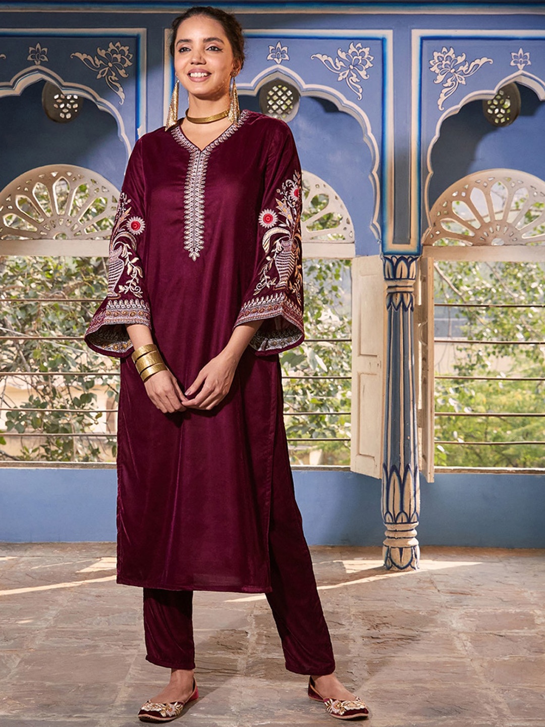

Rustorange Women Floral Embroidered Flared Sleeves Velvet Kurta, Magenta