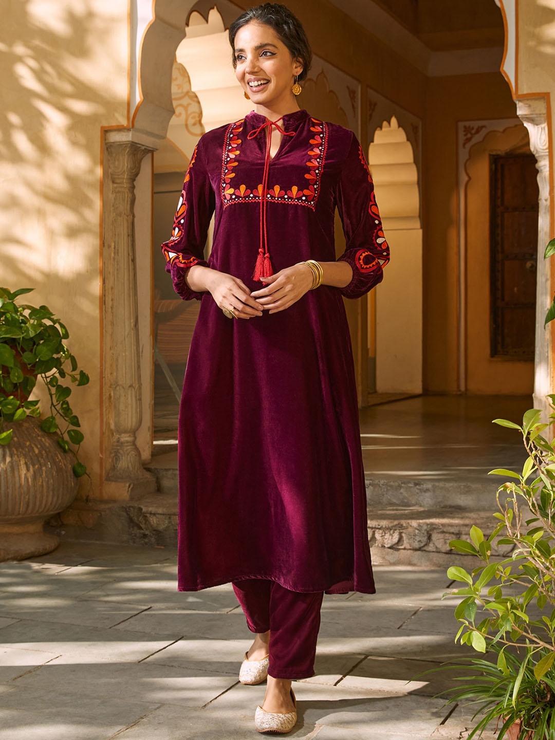 

Rustorange Women Floral Embroidered Velvet Kurta, Magenta