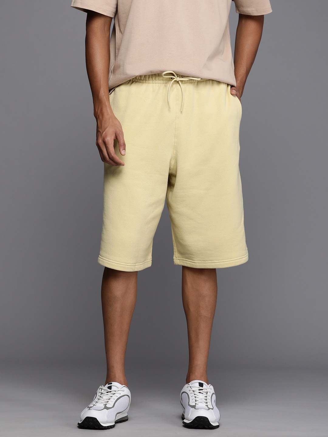 

Nike Men Pure Cotton Loose Fit CIRCA FT Sports Shorts, Yellow