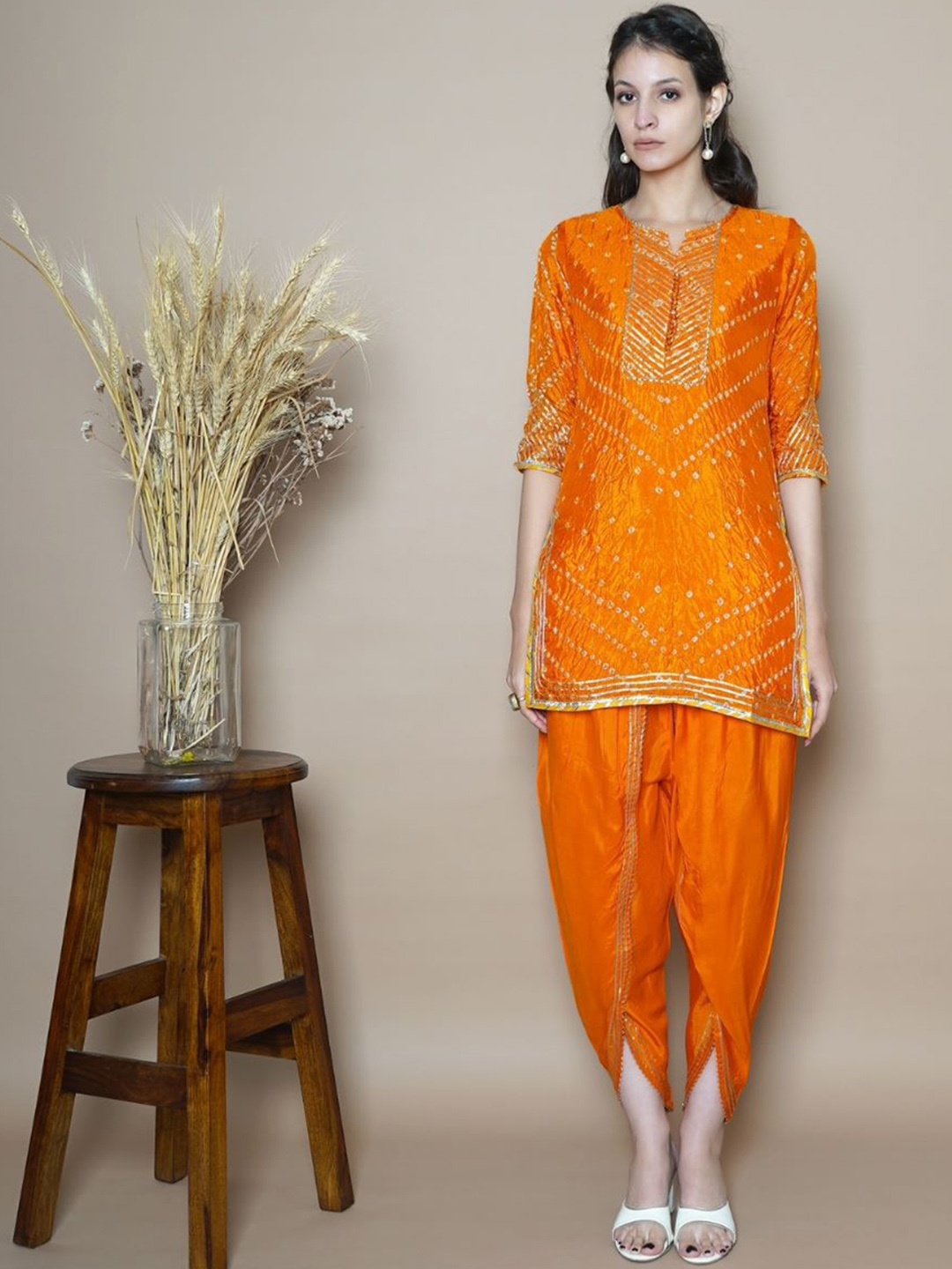 

AUTUMN LANE Women Bandhani Printed Gotta Patti Kurti with Dhoti Pants, Orange