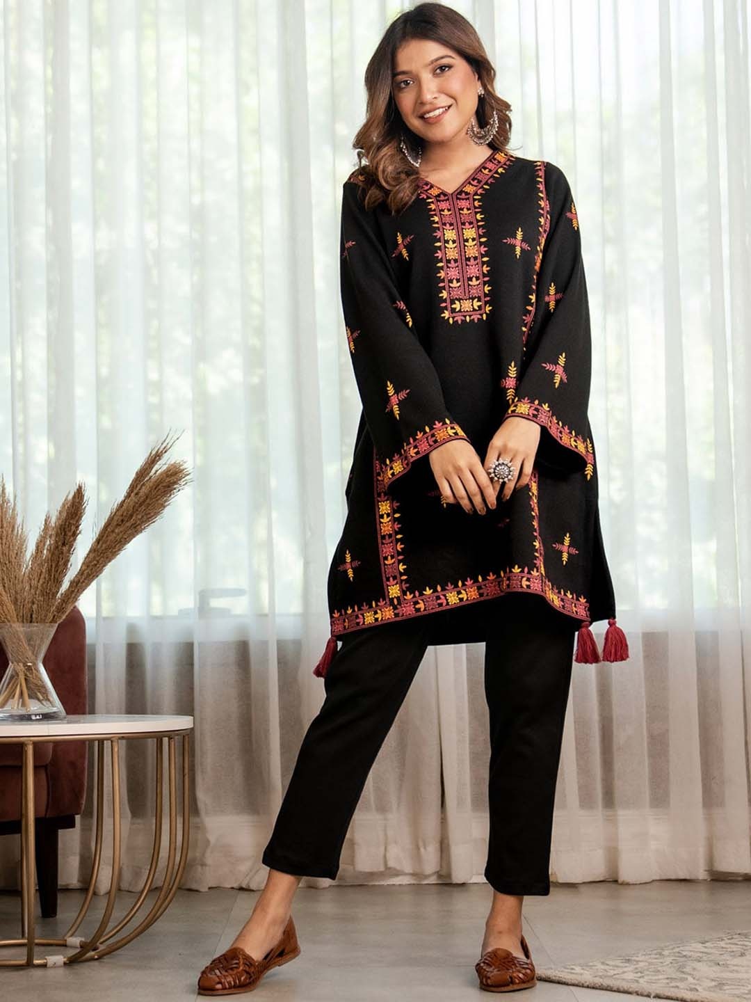 

Rustorange Women Floral Printed Flared Sleeves Acrylic Kurta With Tassel Detailing, Black