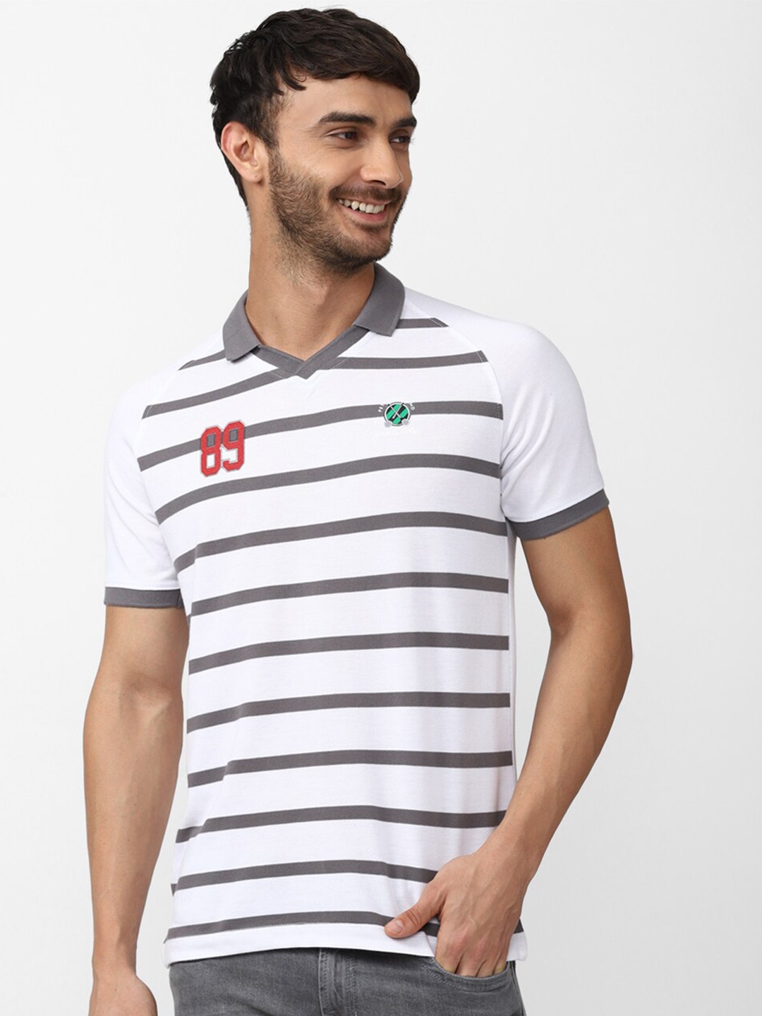 

Peter England Casuals Men Striped Polo Collar T-shirt, White