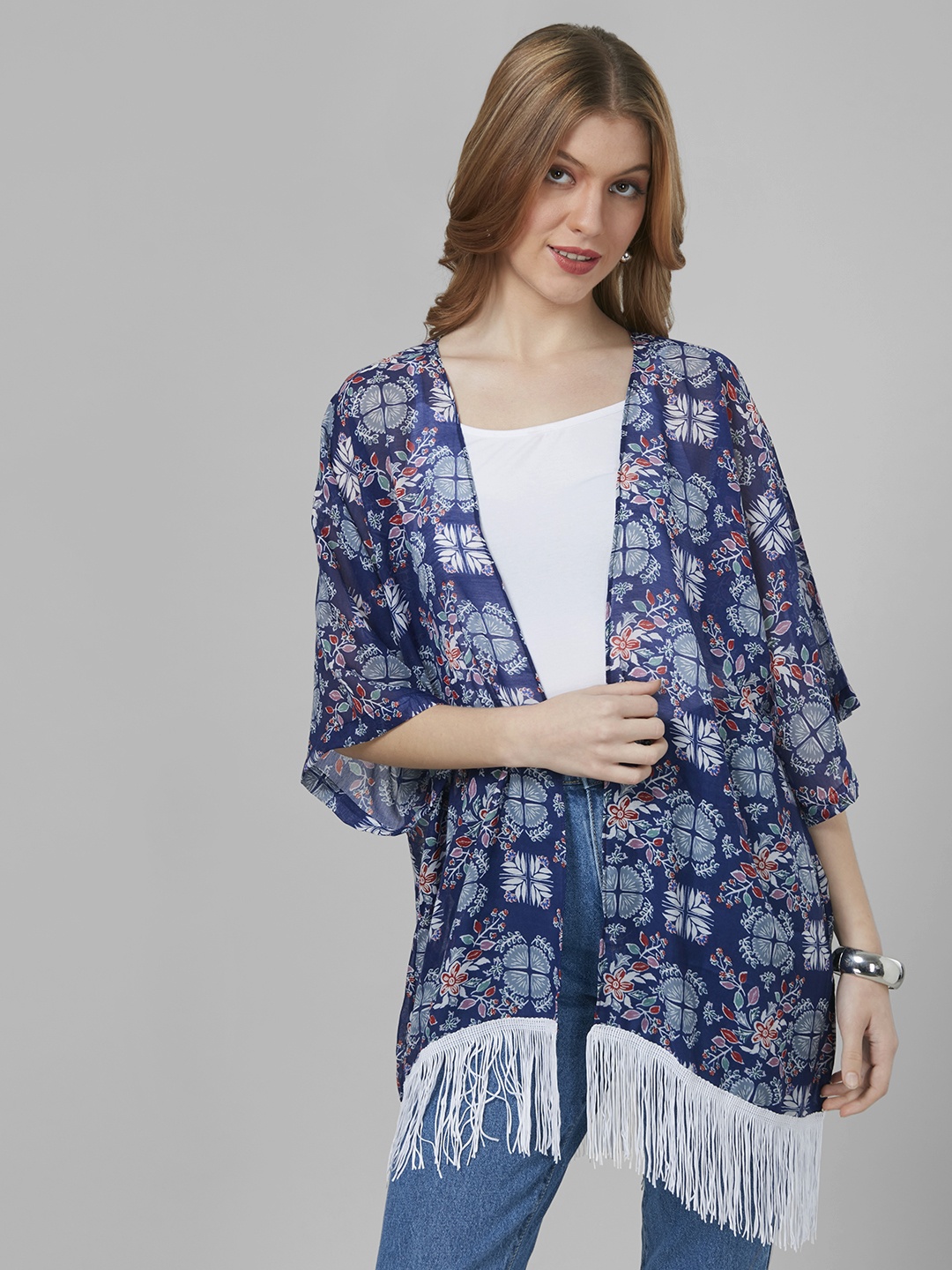 

Style Quotient Women Printed Tasselled Longline Shrug, Blue