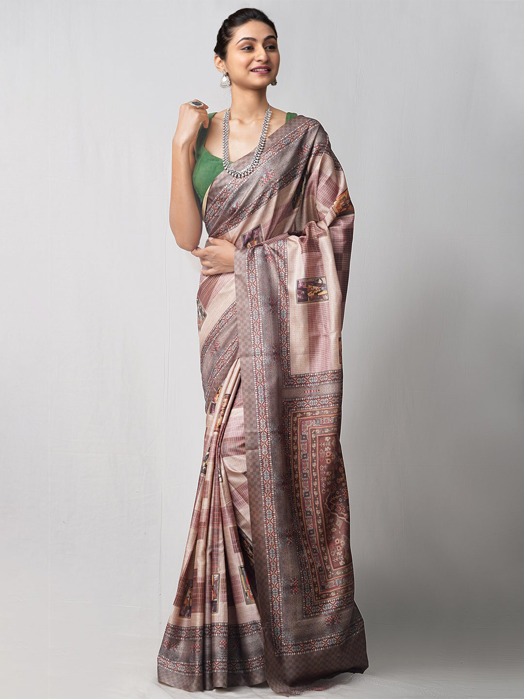 

Unnati Silks Ethnic Motifs Patola Saree, Mauve