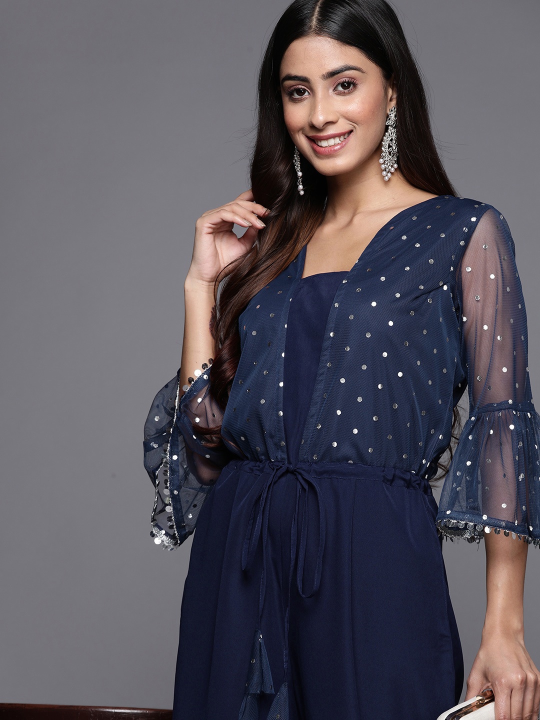 

Ahalyaa Printed Bell Sleeves Crepe Basic Jumpsuit With Waist Tie-Ups, Navy blue