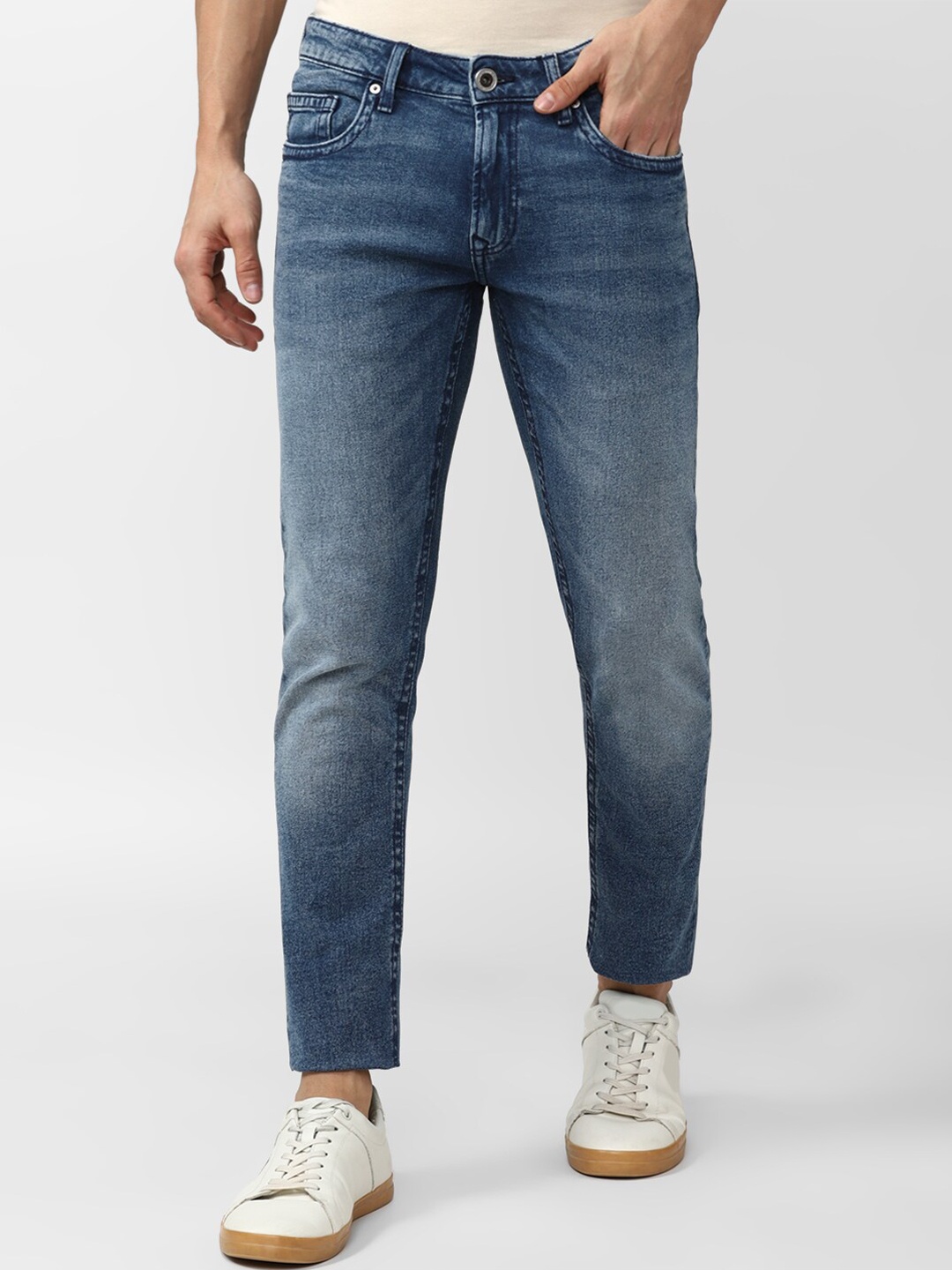 

Peter England Casuals Men Cotton Slim Fit Heavy Fade Jeans, Blue