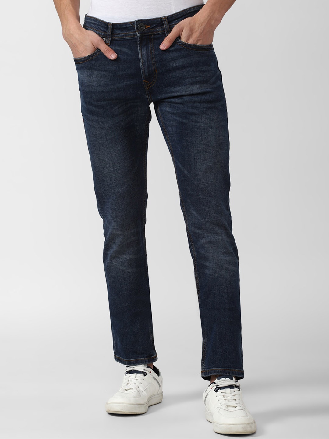 

Peter England Casuals Men Cotton Slim Fit Light Fade Jeans, Navy blue