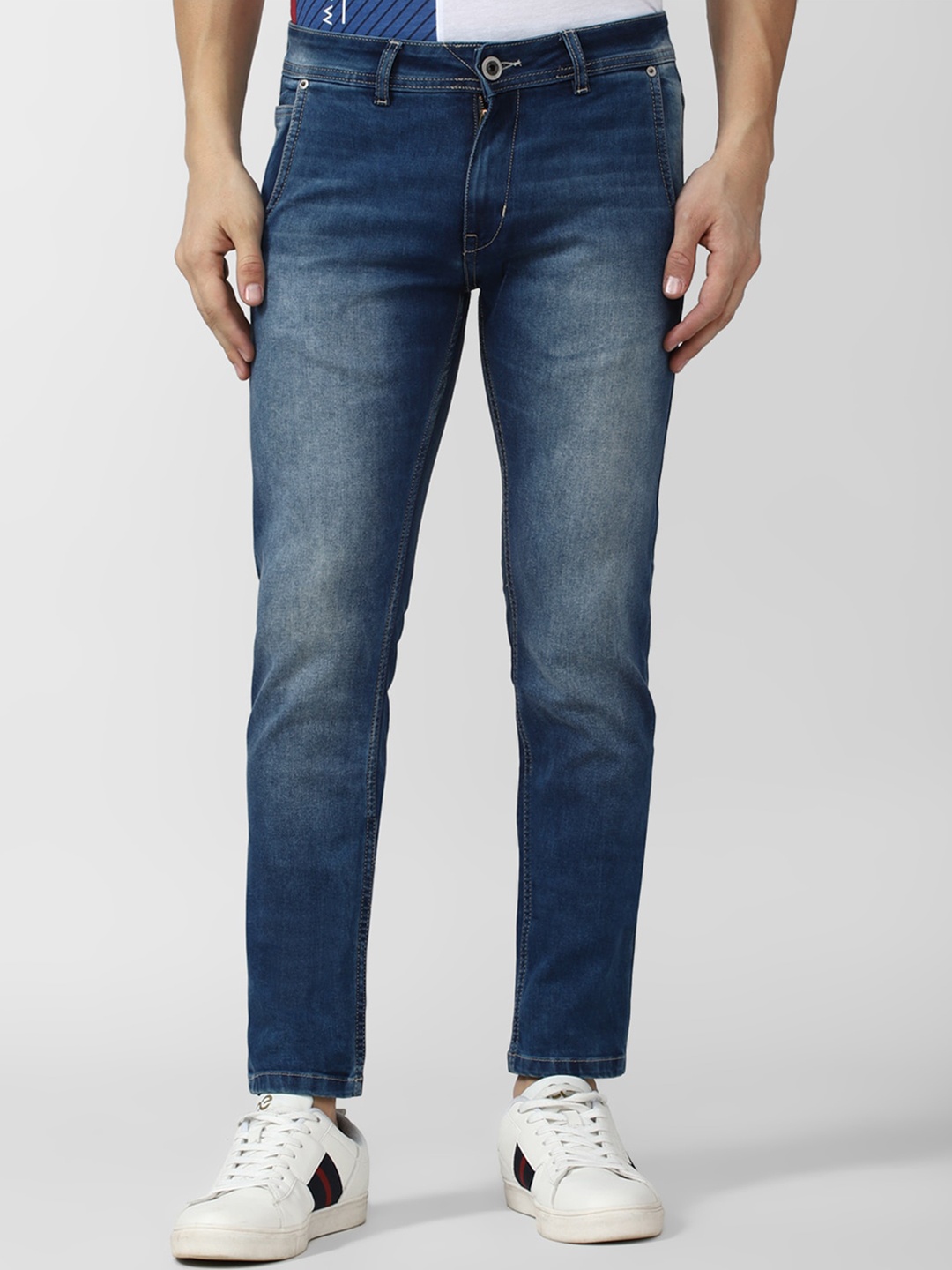 

Peter England Casuals Men Cotton Heavy Fade Jeans, Blue