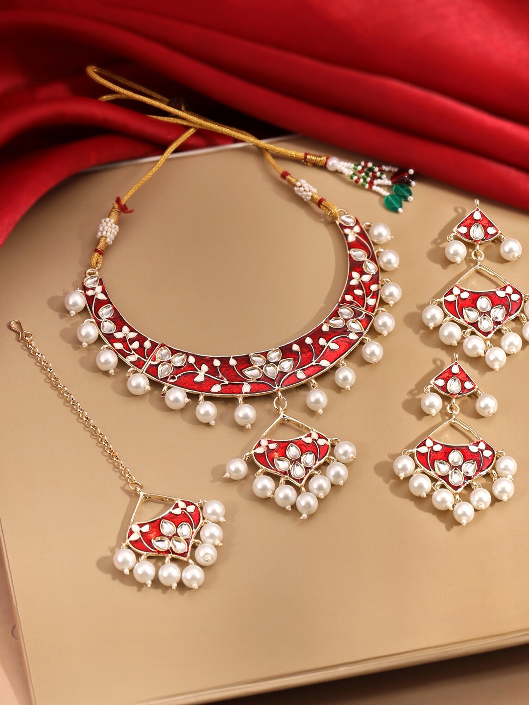 

Yellow Chimes Gold-Plated Kundan Studded & Beaded Meenakari Jewellery Set With Maang Tika