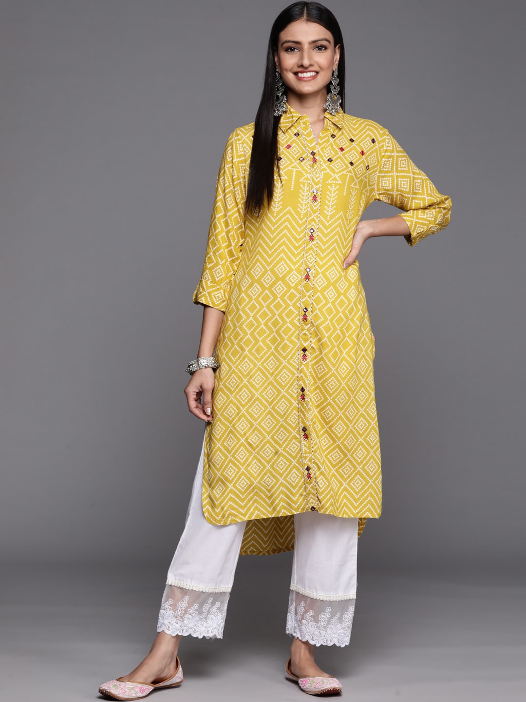 

Varanga Women Geometric Printed Thread Work High Low Kurta, Yellow