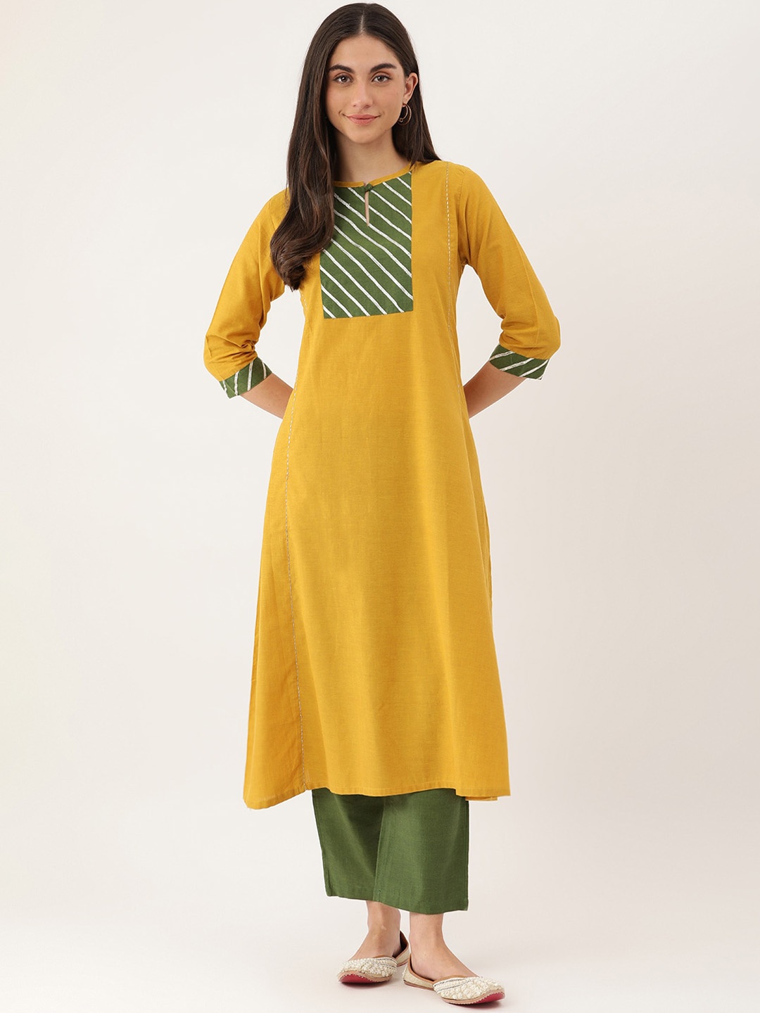 

Lokatita Women Yoke Design Gota Patti Cotton Kurta, Yellow