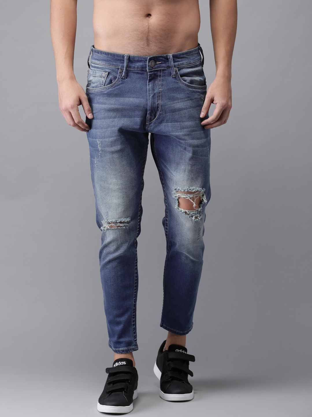 

Moda Rapido Men Blue Slim Tapered Fit Cropped Mid-Rise Mildly Distressed Stretchable Jeans