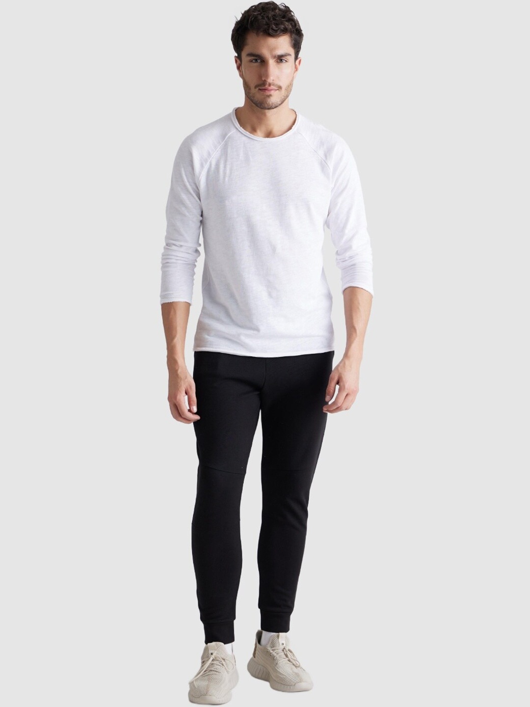 

Celio Men Mid-Rise Regular Fit Joggers, Black