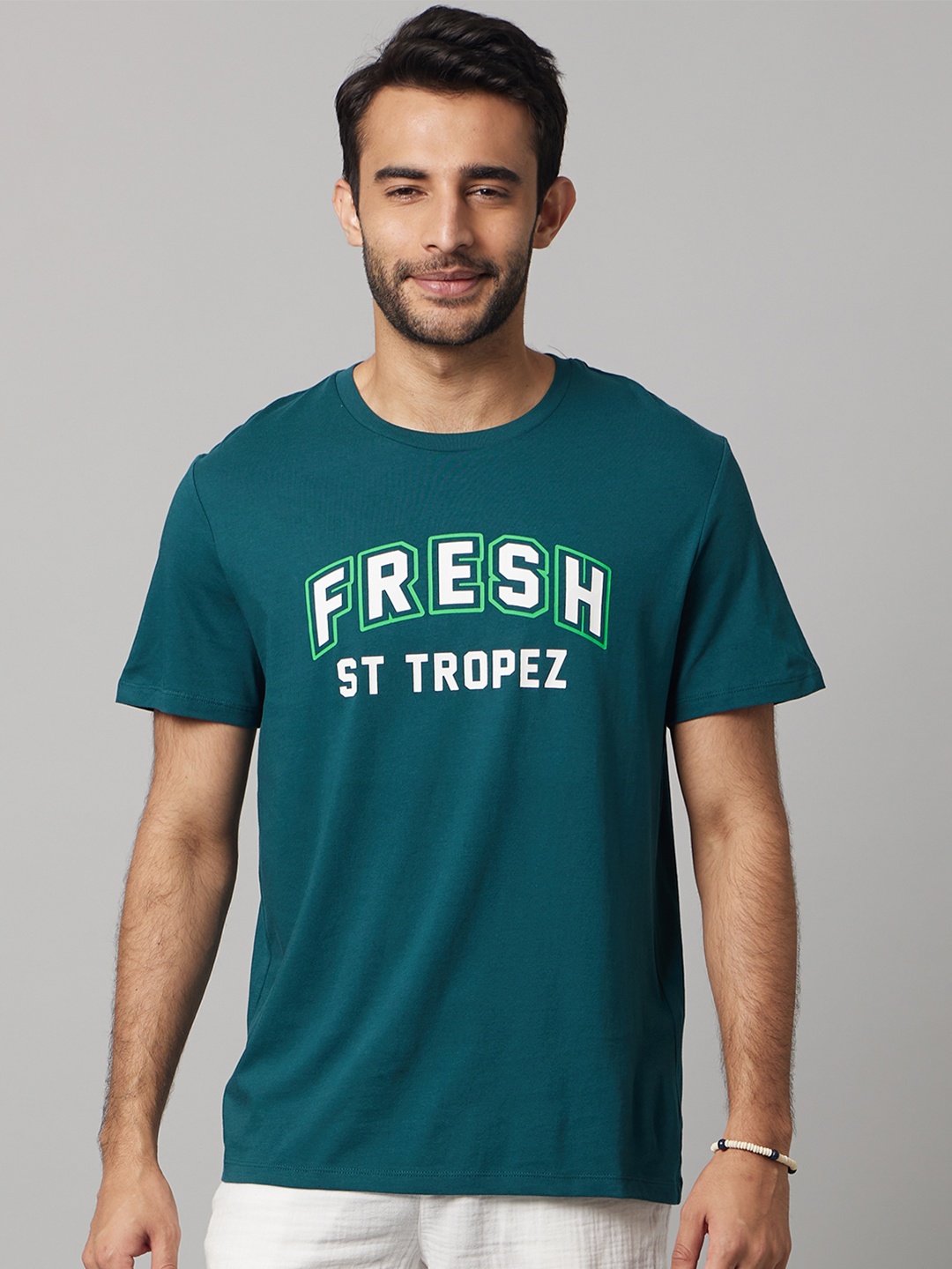 

Celio Men Teal Typography Printed T-shirt