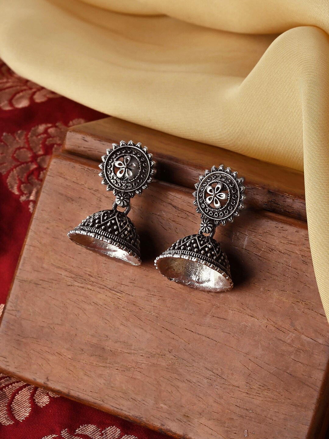 

TEEJH Silver-Plated Oxidised Contemporary Jhumkas Earrings