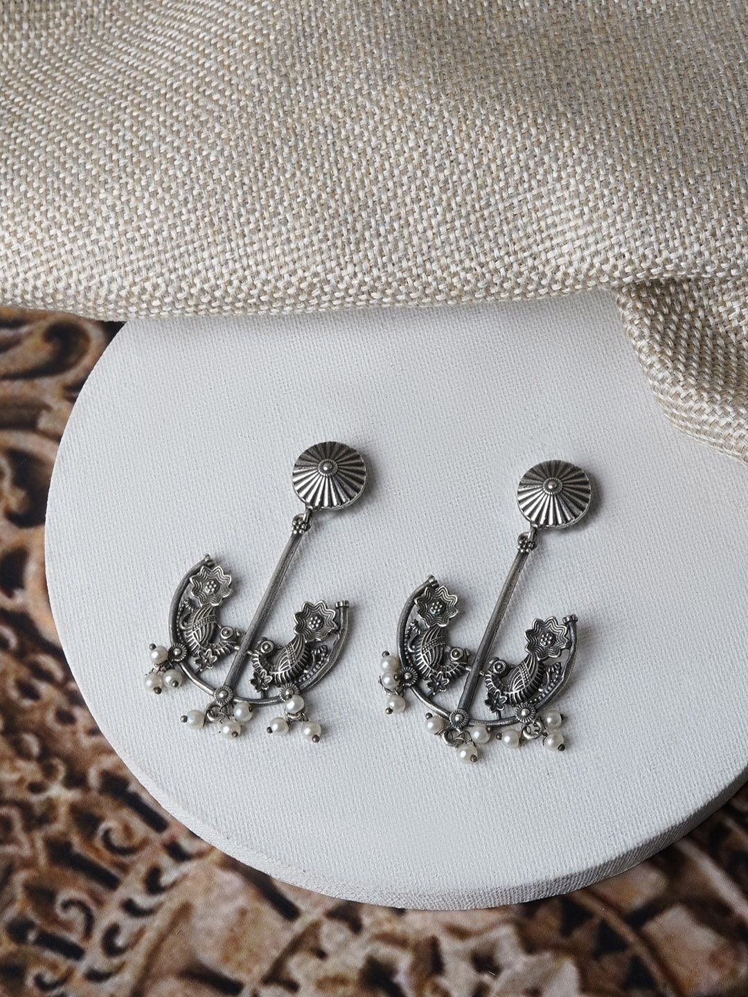 

TEEJH Silver-Plated Contemporary Drop Earrings