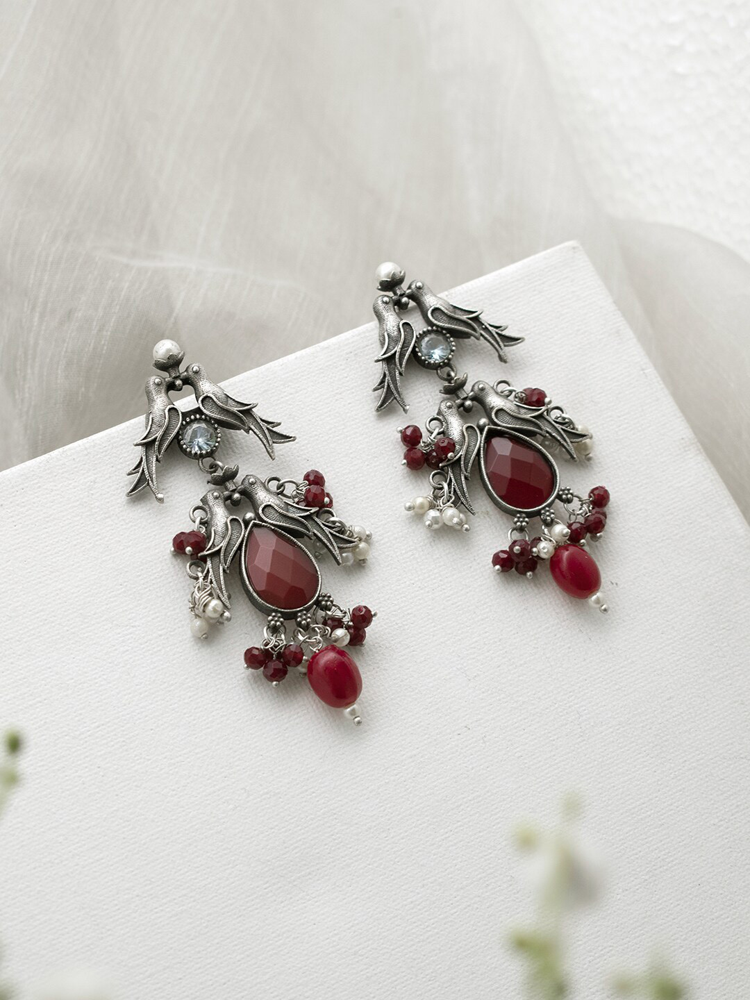 

TEEJH Silver Plated Oxidised Animal Shaped Drop Earrings