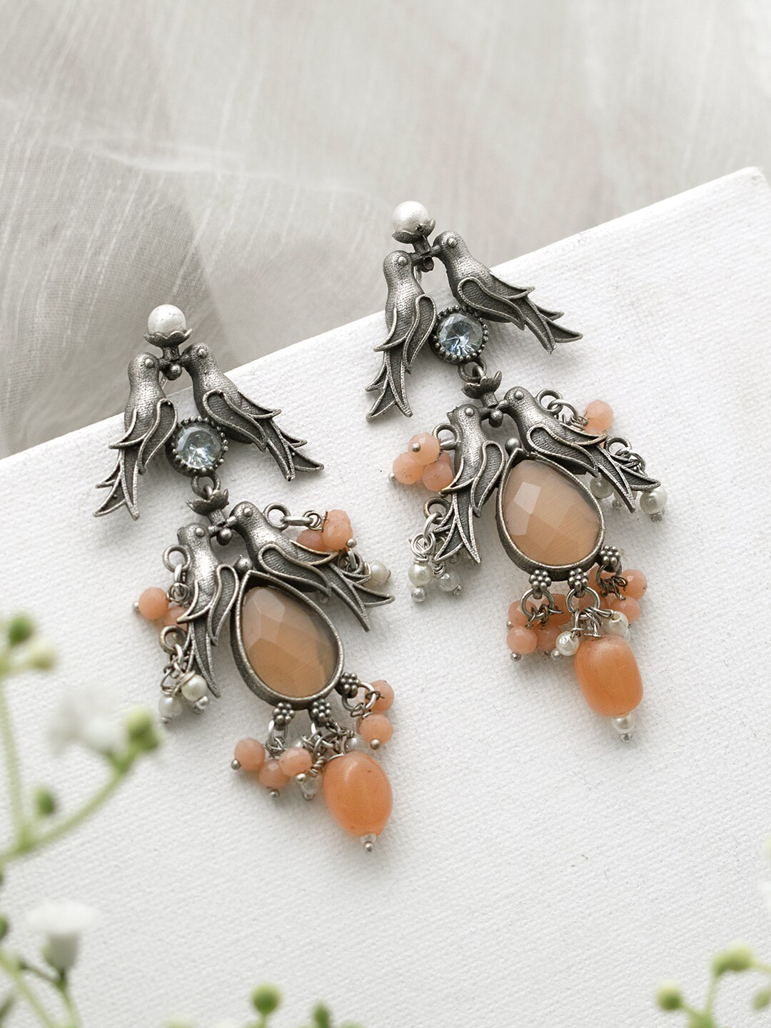 

TEEJH Silver-Plated Contemporary Jhumkas Earrings