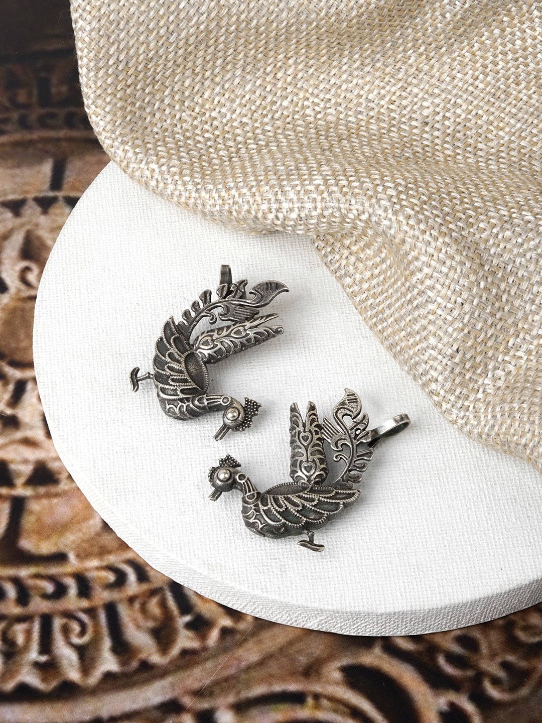 

TEEJH Silver-Toned Peacock Oxidised Contemporary Ear Cuff Earrings