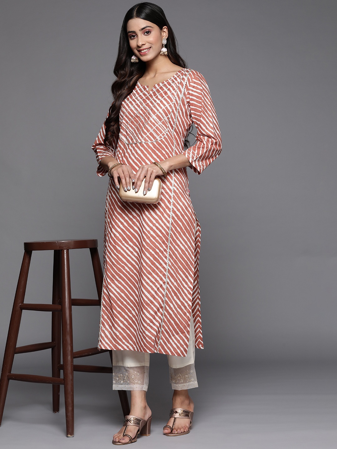 

Varanga Women Leheriya Striped Gotta Patti Kurta, Rust