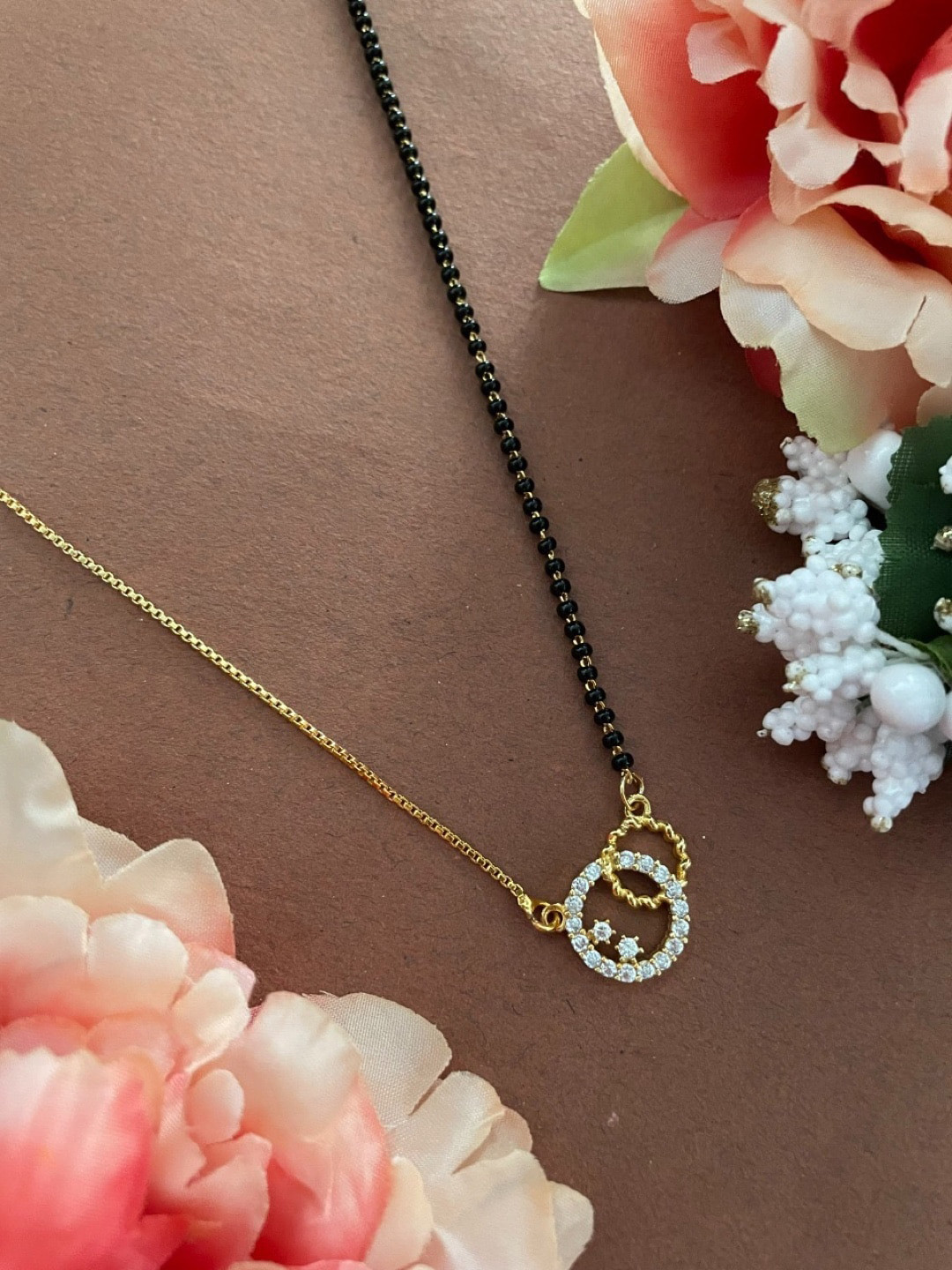 

Digital Dress Room Gold-Plated AD-Studded & Beaded Mangalsutra