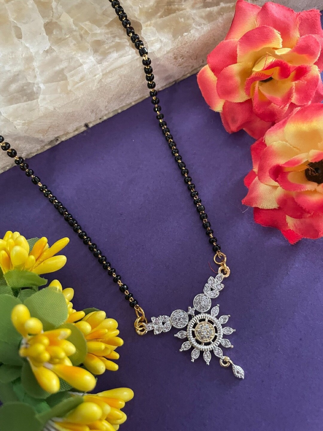 

Digital Dress Room Gold-Plated AD-Studded & Beaded Mangalsutra