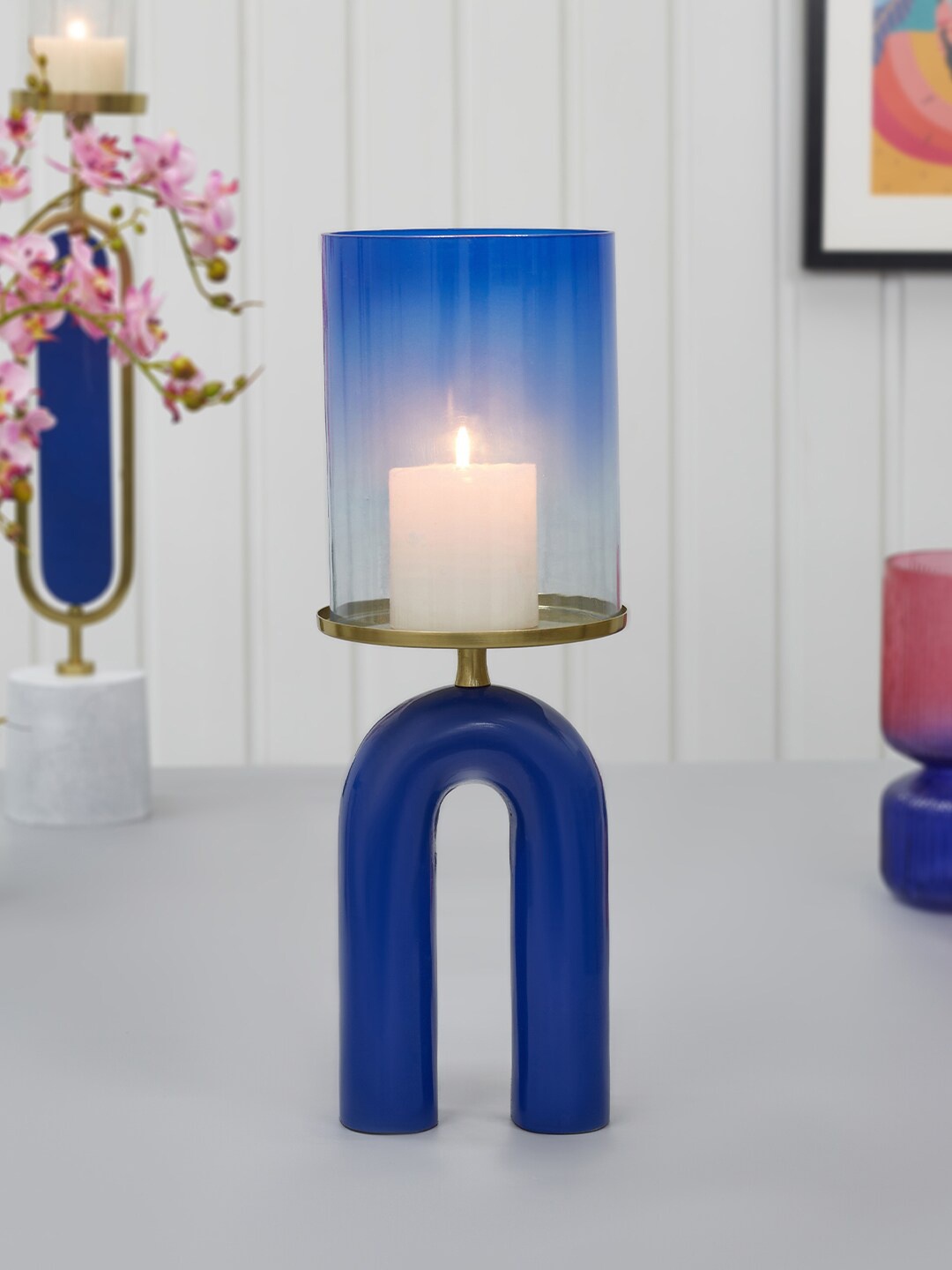 

HomeTown Navy Blue Ombre Athena Aluminum and Glass Rainbow Candle Holder