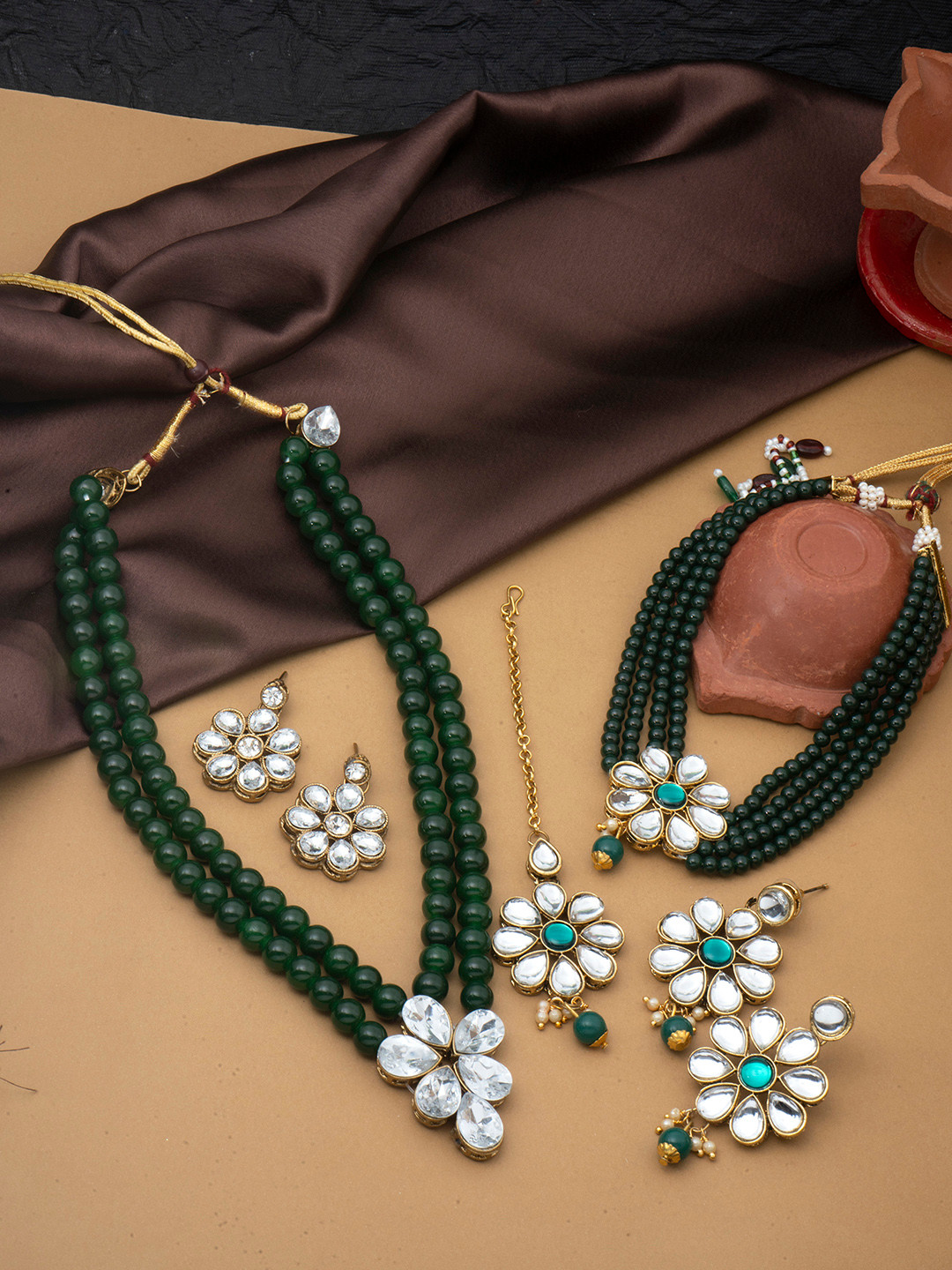 

Yellow Chimes Women Set of 2 Gold-Plated Kundan Studded Jewellery Set, Green