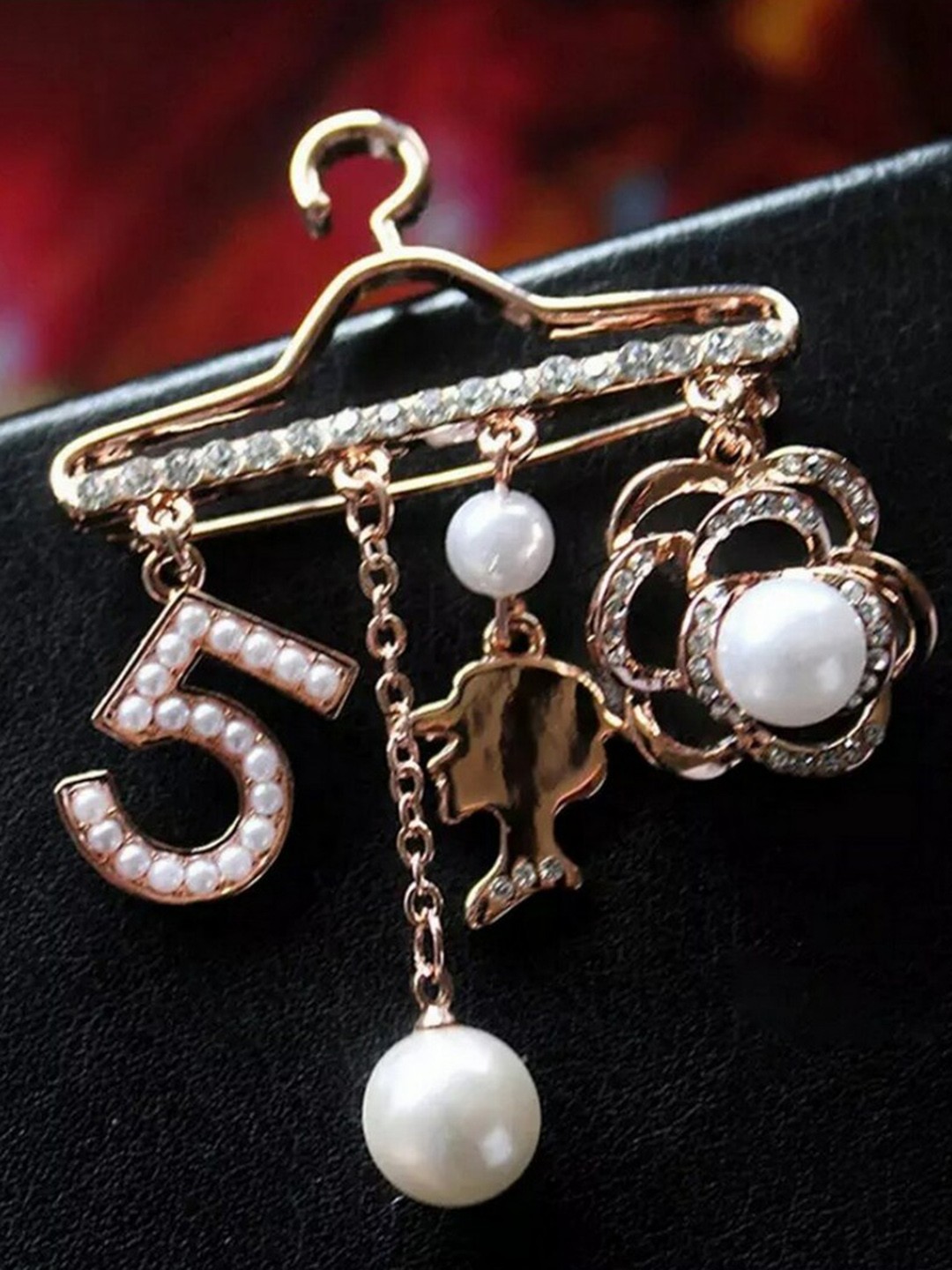 

UNIVERSITY TRENDZ Women Rose Gold-Plated 5 Element Cloth Hanger Shaped Brooch, White