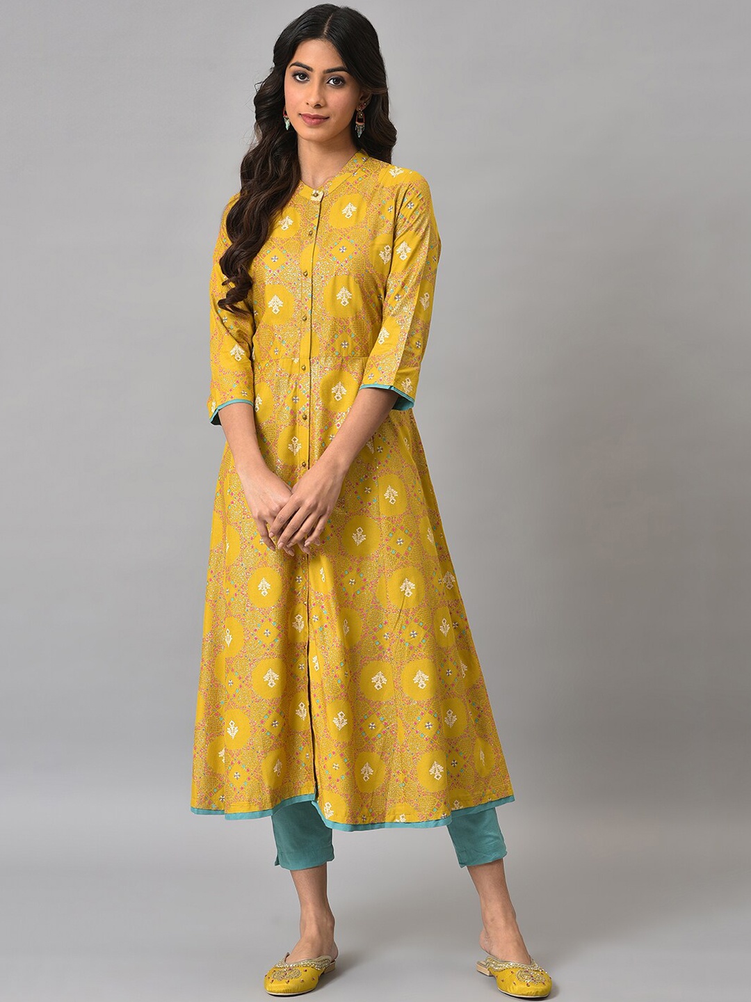 

W Women Ethnic Motifs Printed Kurta with Trousers, Yellow