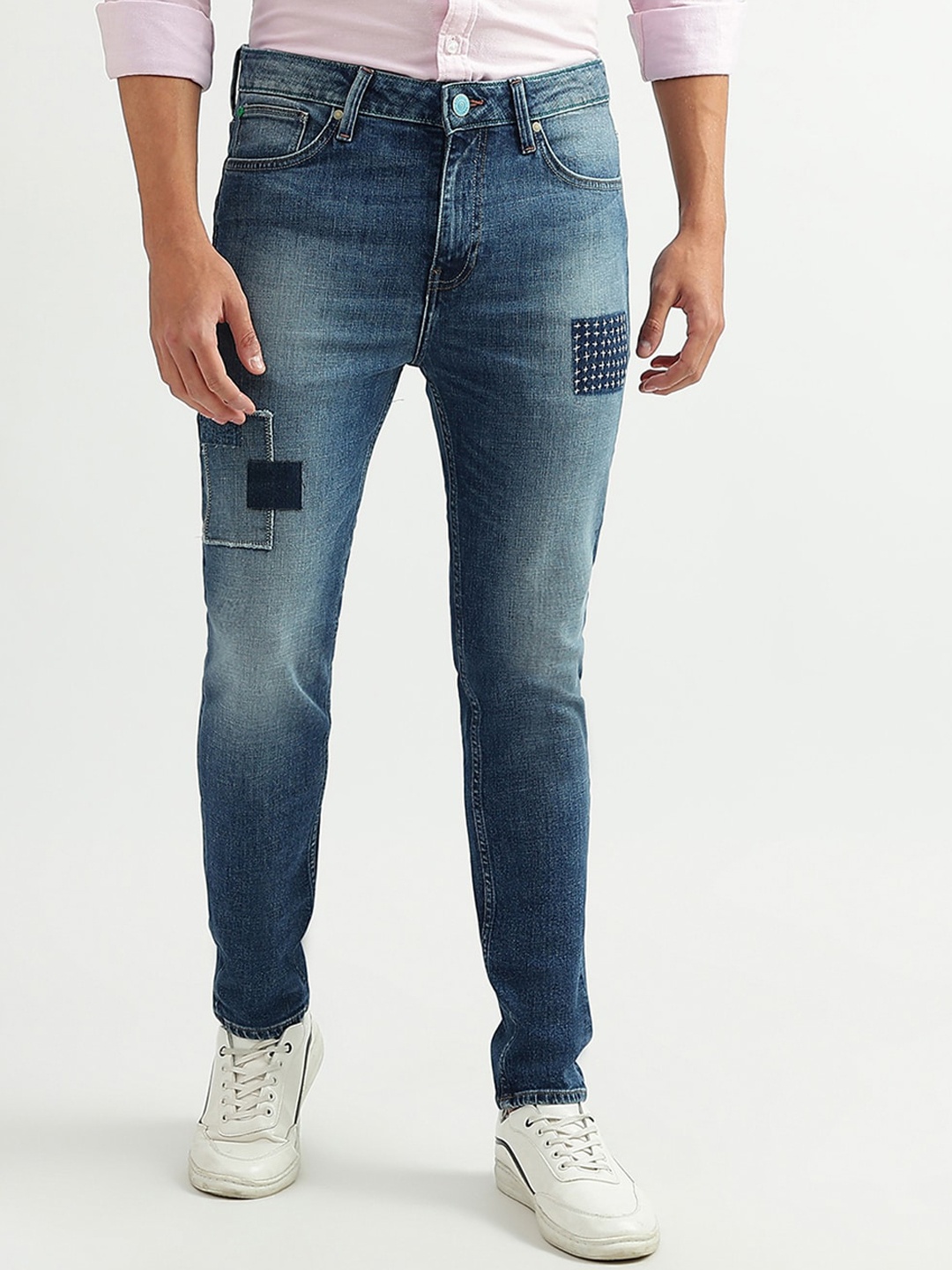 

United Colors of Benetton Men Mildly Distressed Heavy Fade Jeans, Blue