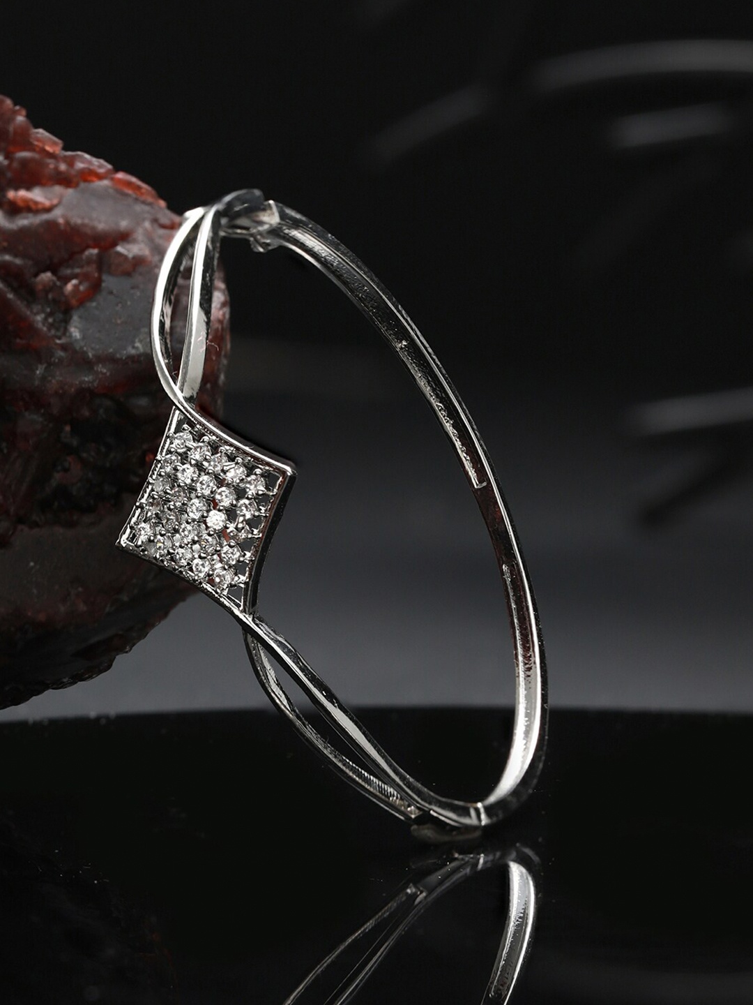 

Priyaasi Women Brass American Diamond Silver-Plated Bangle-Style Bracelet