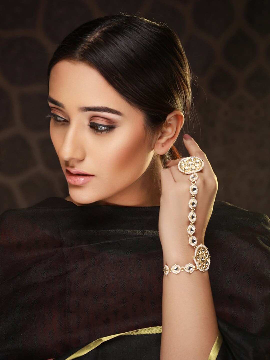 

Priyaasi Women Brass Kundan Gold-Plated Link Bracelet