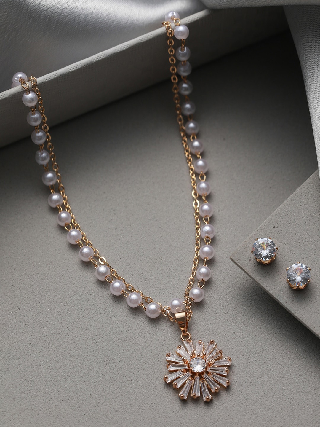 

Priyaasi Women Gold-Plated AD Studded Pearl Beaded Dual Layered Jewellery Set, White