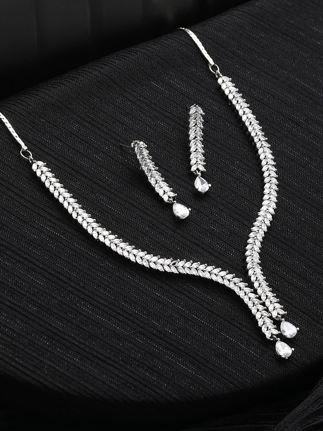 

Priyaasi Women Silver-Plated AD Studded & Beaded Leaf Shaped Jewellery Set, White