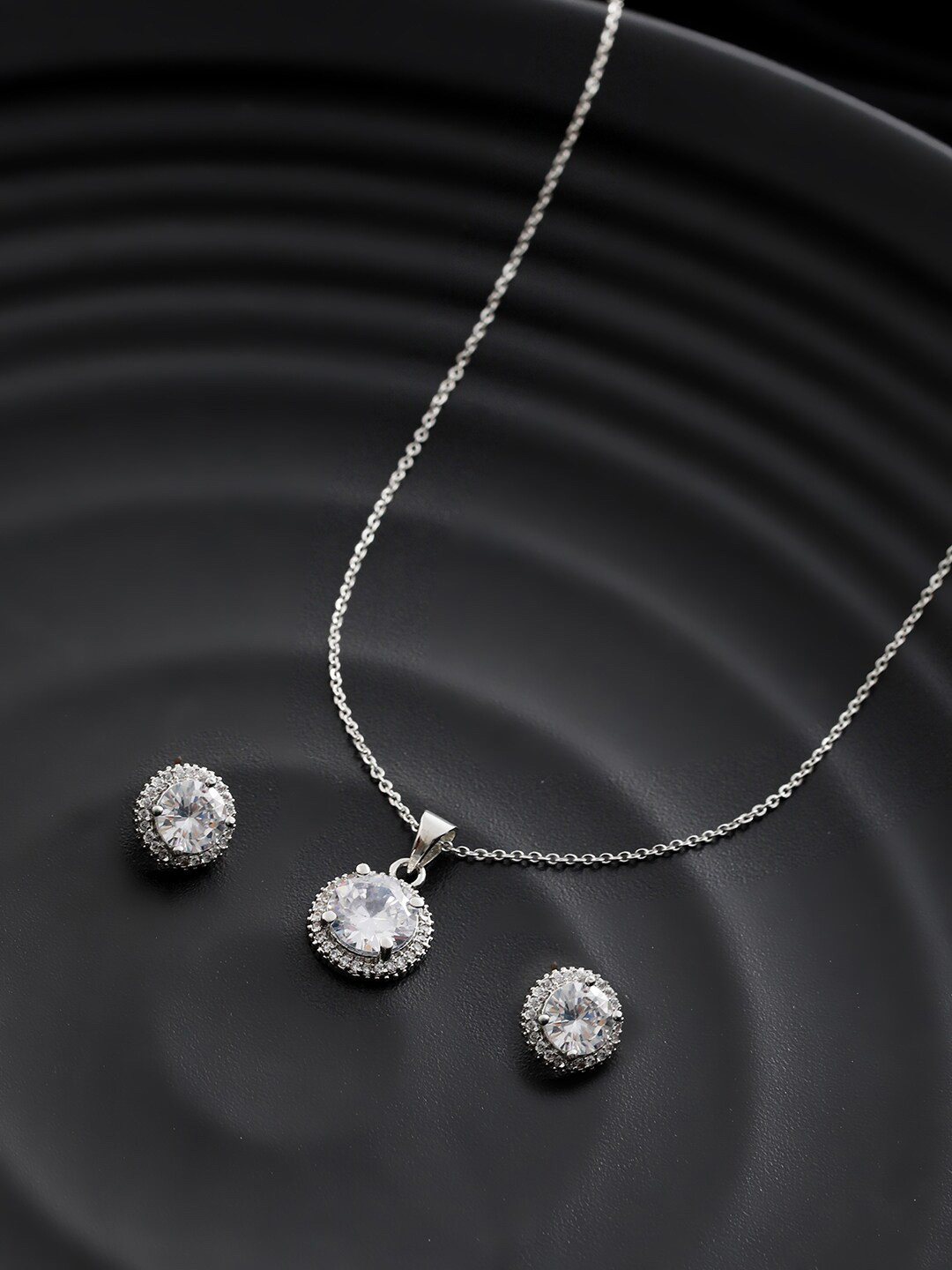 

Priyaasi Silver-Plated AD Stone-Studded Solitaire Jewellery Set