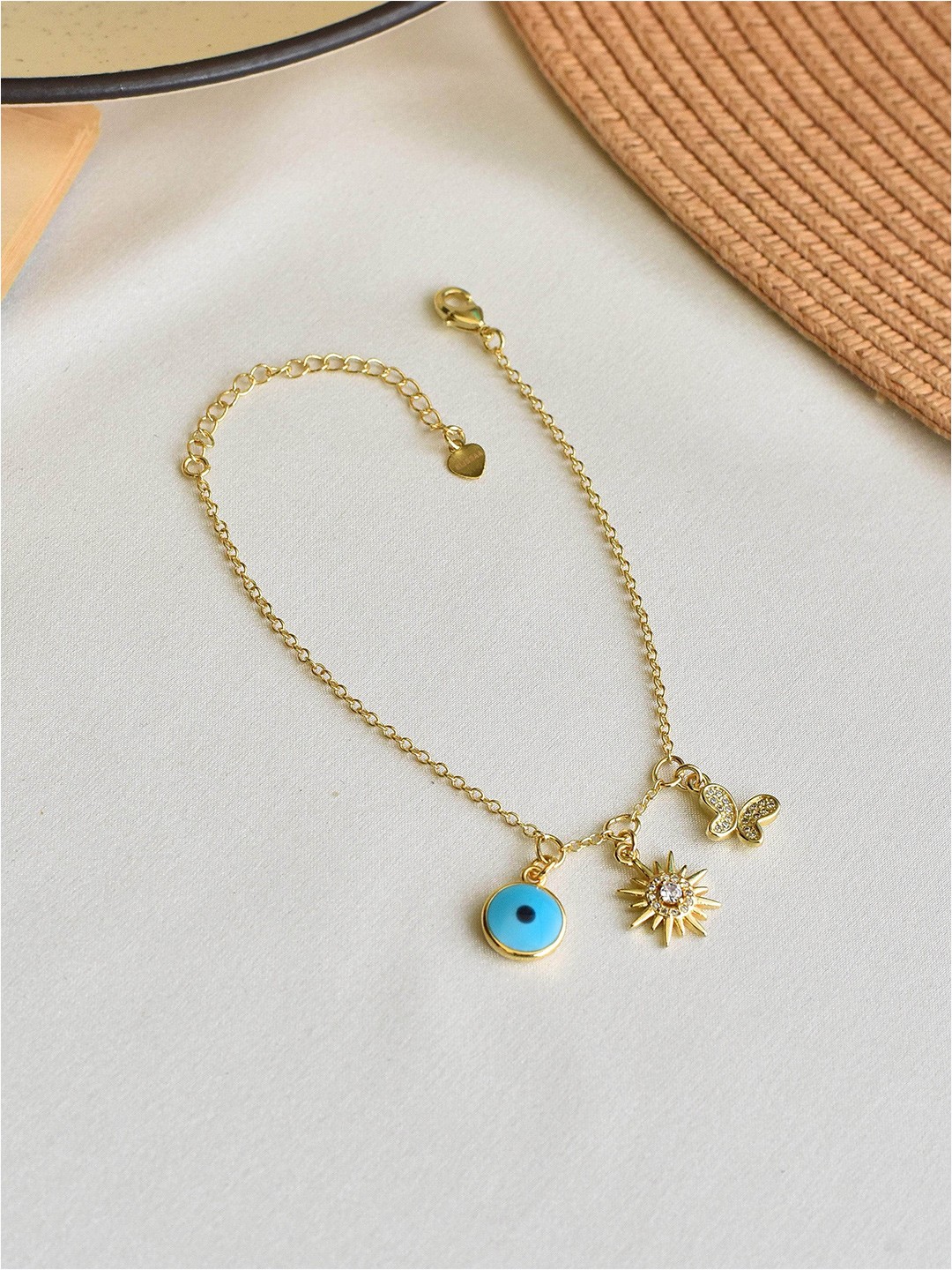 

Klissaa Women Brass Gold-Plated Charm Bracelet