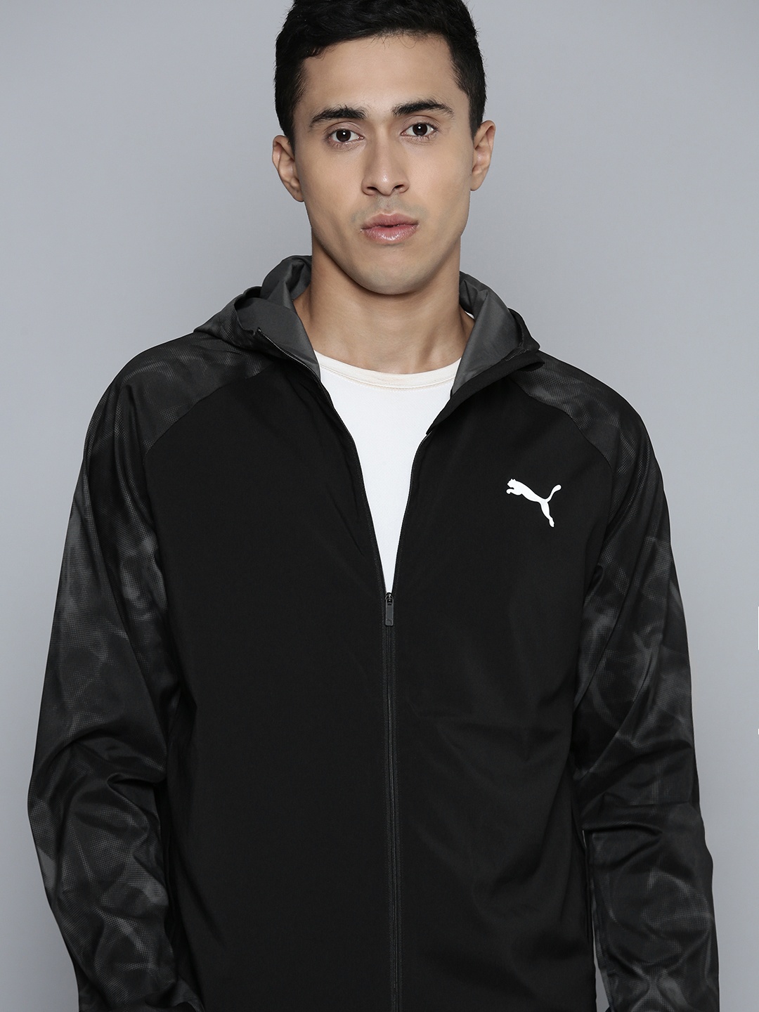 

Puma Printed RUN FAV AOP WOVEN Running dryCELL Sporty Jacket, Black