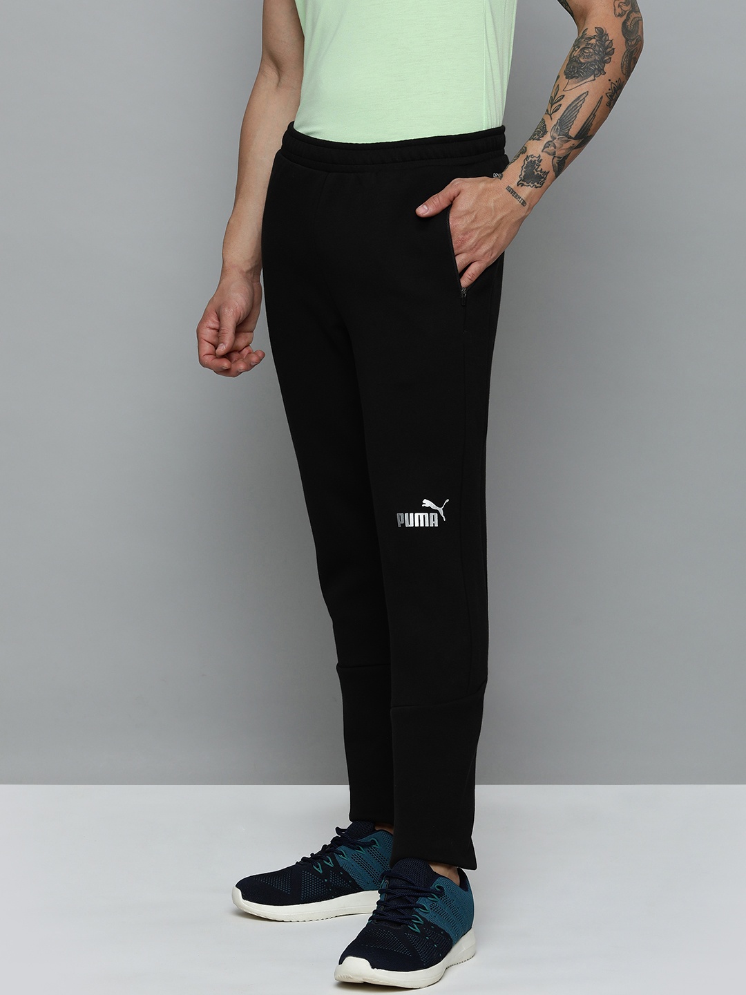 

Puma Men Solid Mid Rise Slim Fit Team FINAL Track Pants, Black