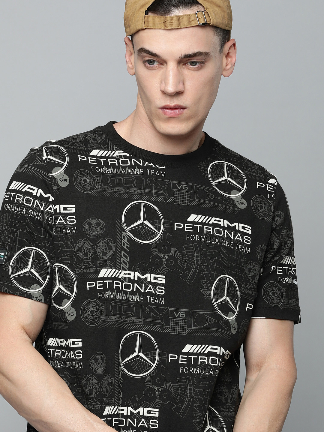 

PUMA Motorsport Men Mercedes AMG Petronas AOP Print Regular fit Pure Cotton Sustainable T-shirt, Black
