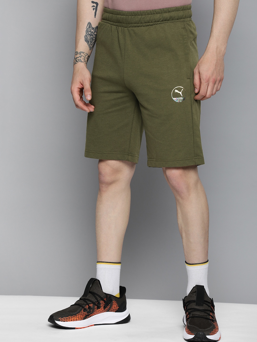 

one8 x PUMA Men Solid Slim Fit Outdoor Shorts, Olive