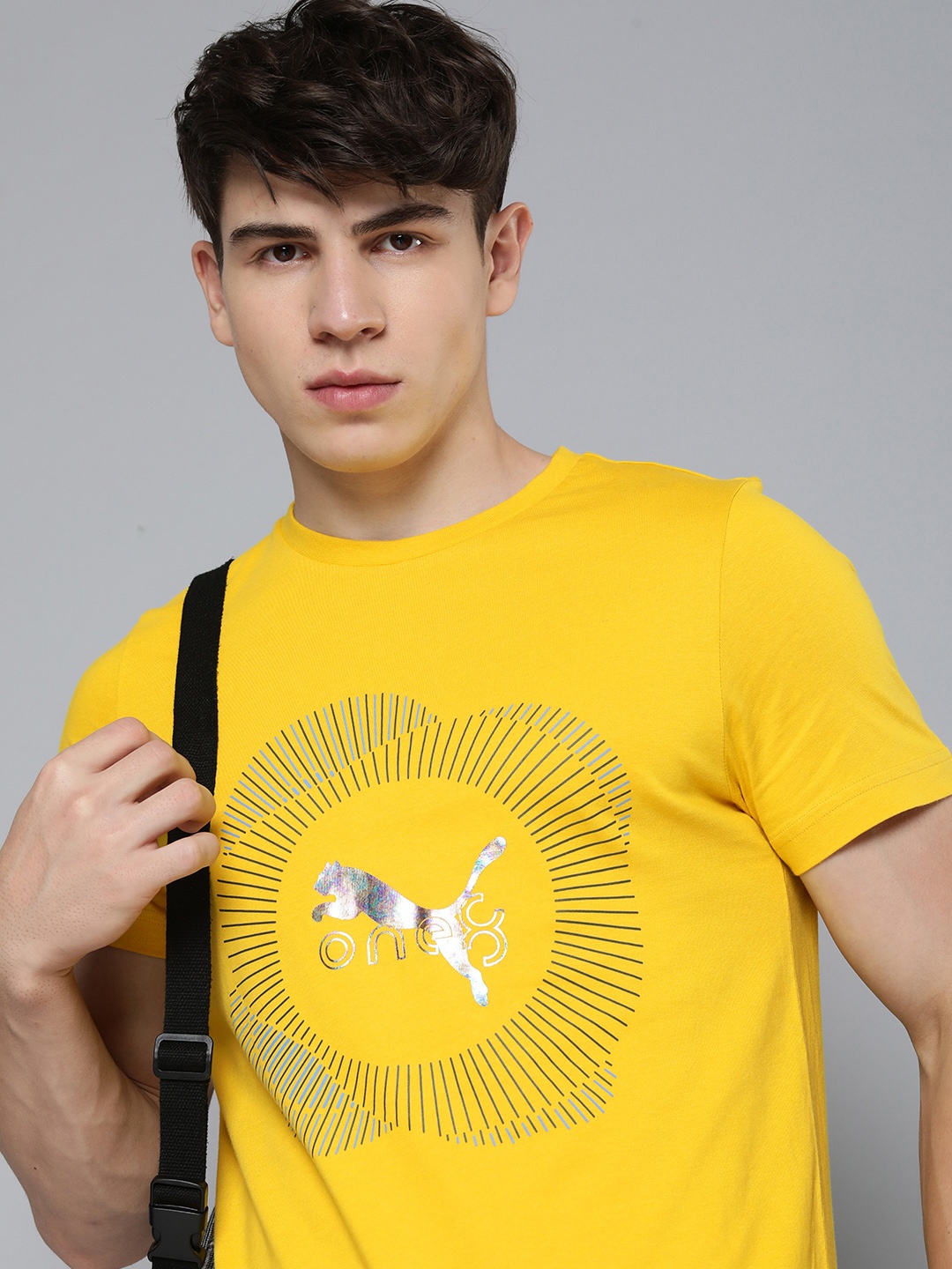 

one8 x PUMA Men Graphic Printed Pure Cotton Slim Fit T-shirt, Yellow