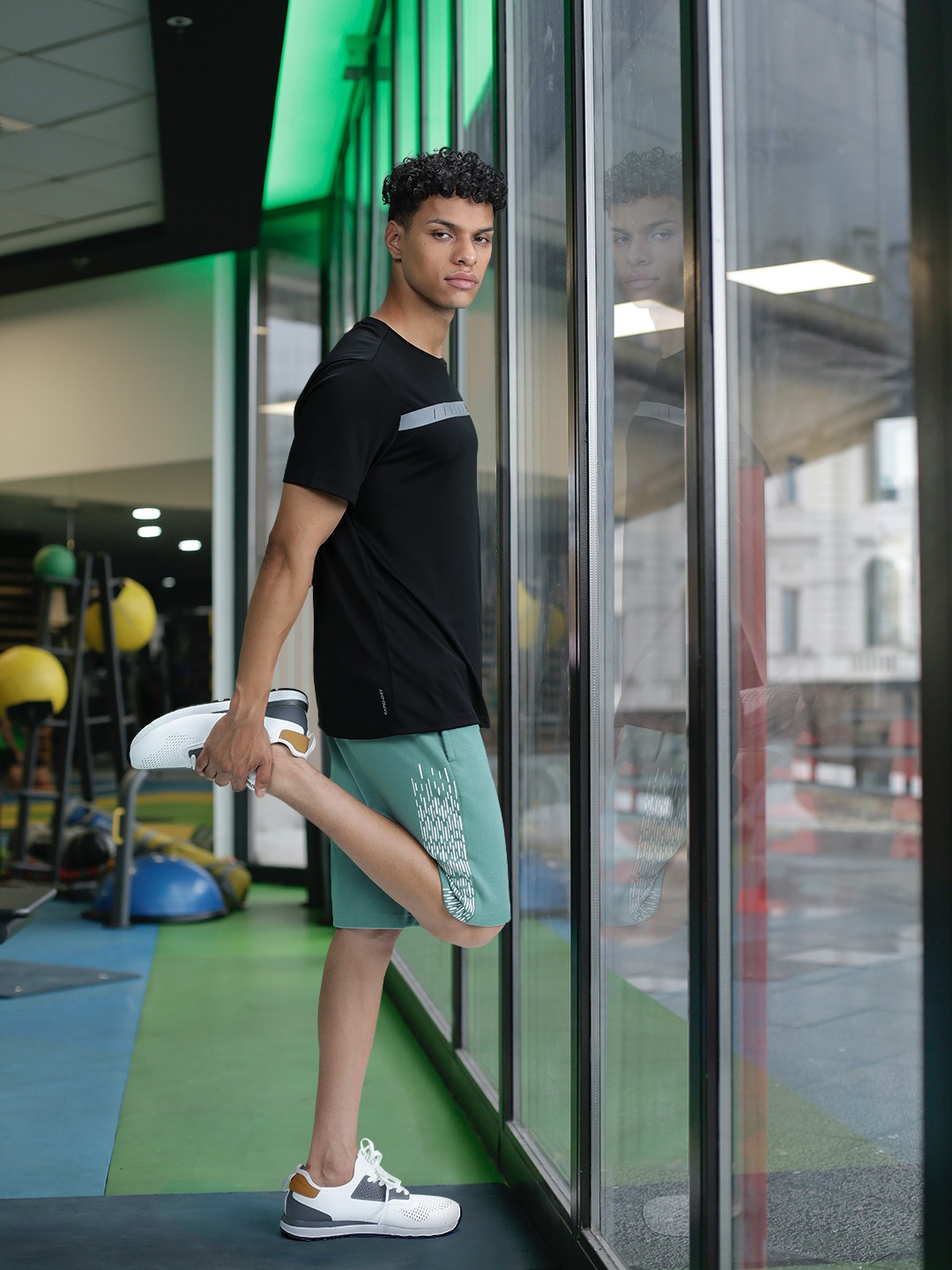 

one8 x PUMA Men Geometric Printed Slim Fit Outdoor Shorts, Green