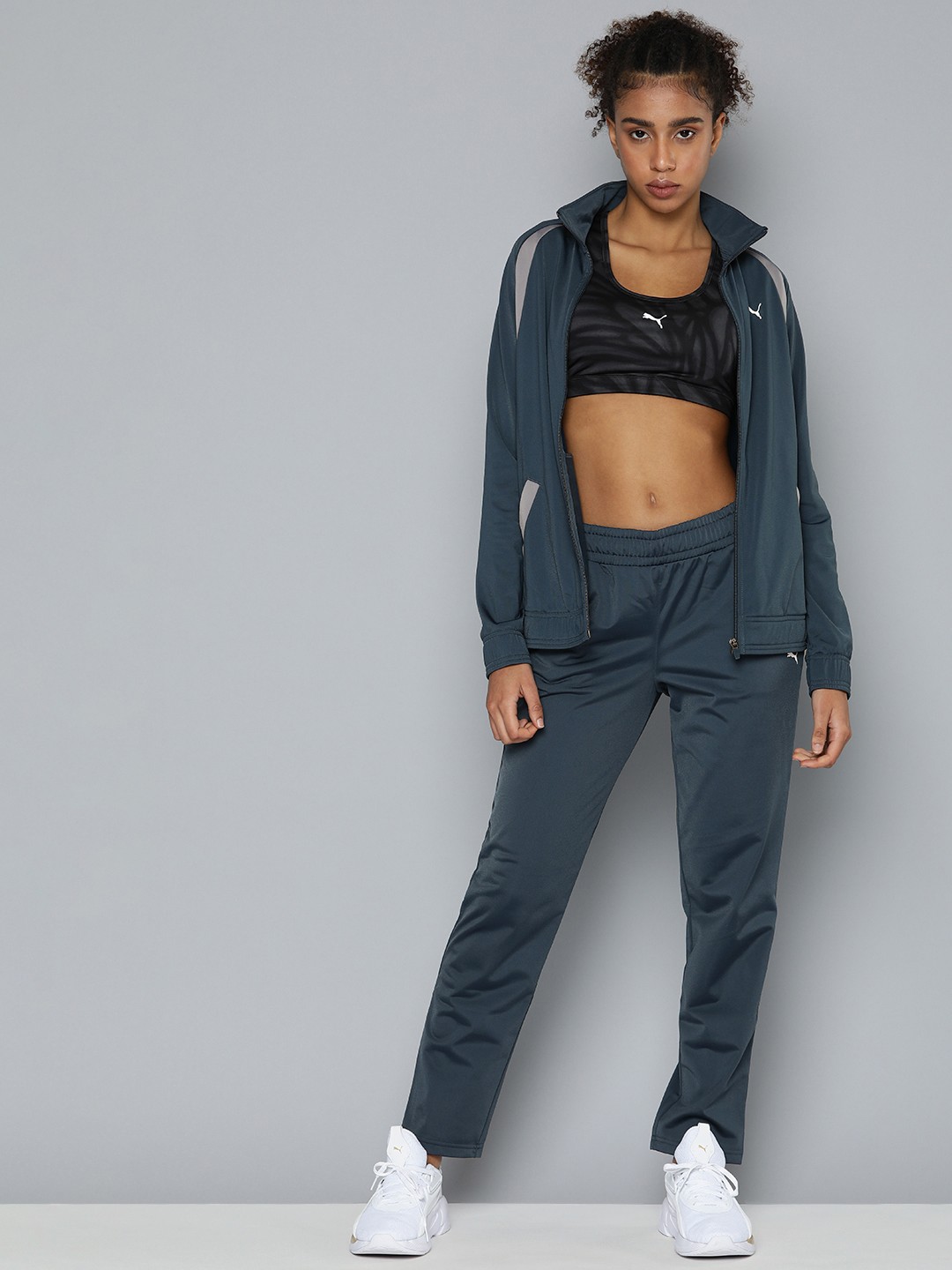 

Puma Women Solid Raglan Sleeves Classic Tricot Regular fit Track Suit, Blue