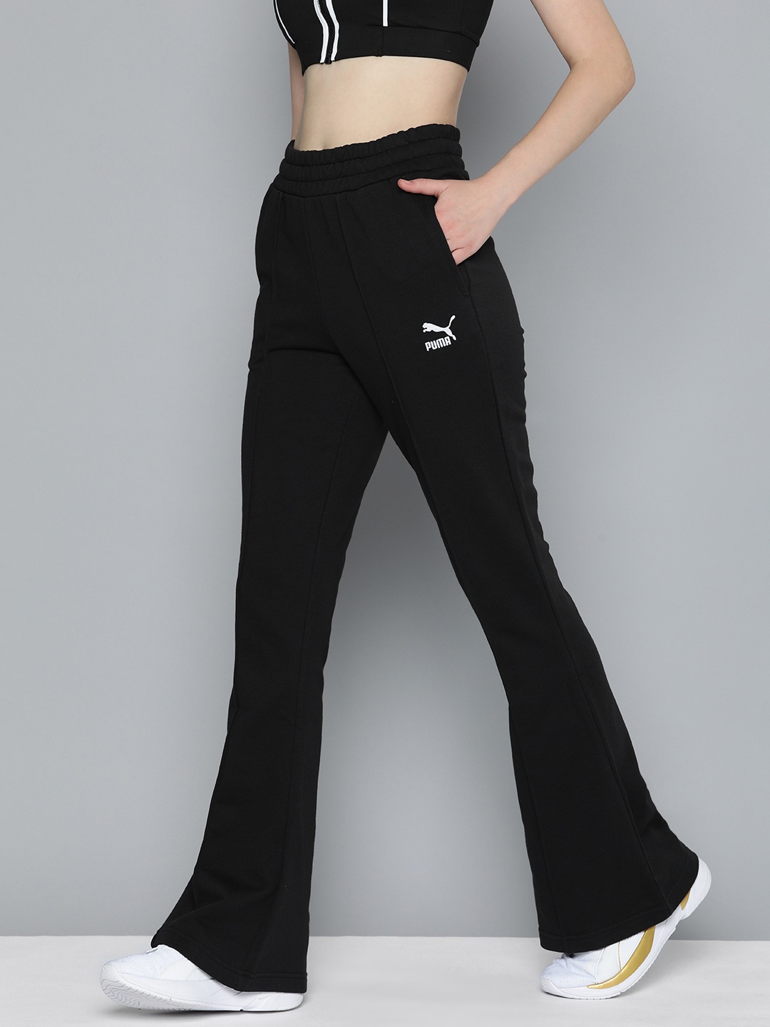 

Puma Women CLASSICS Solid Slim Fit Flared Sustainable Track Pants, Black