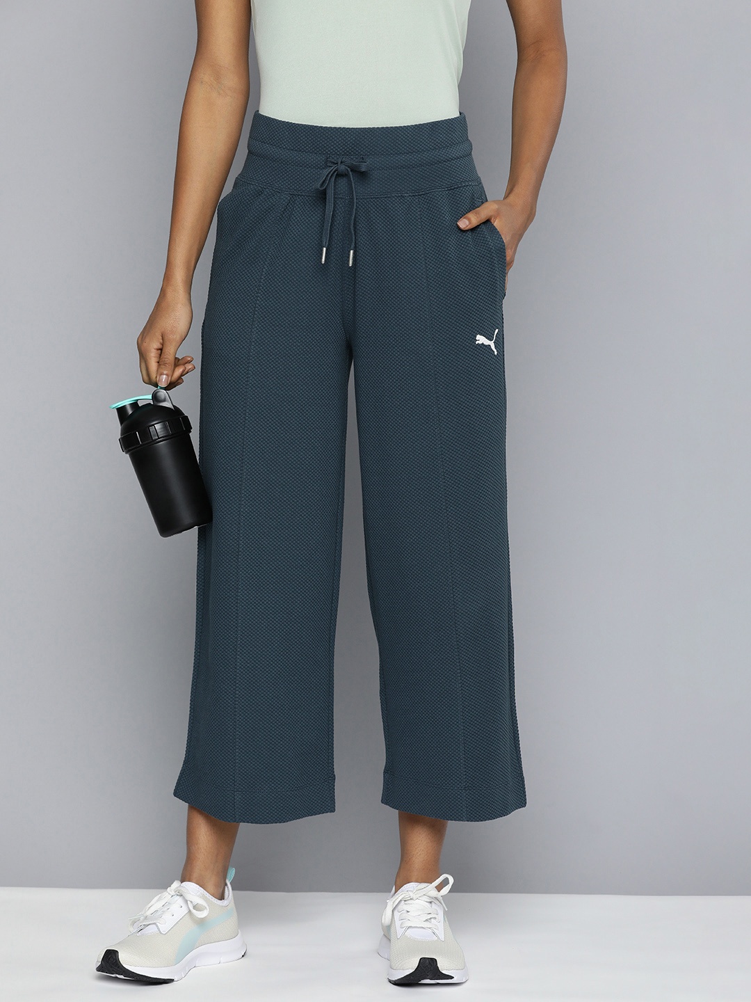 

Puma Women Sustainable HER Self Design Cropped Straight Pants, Blue